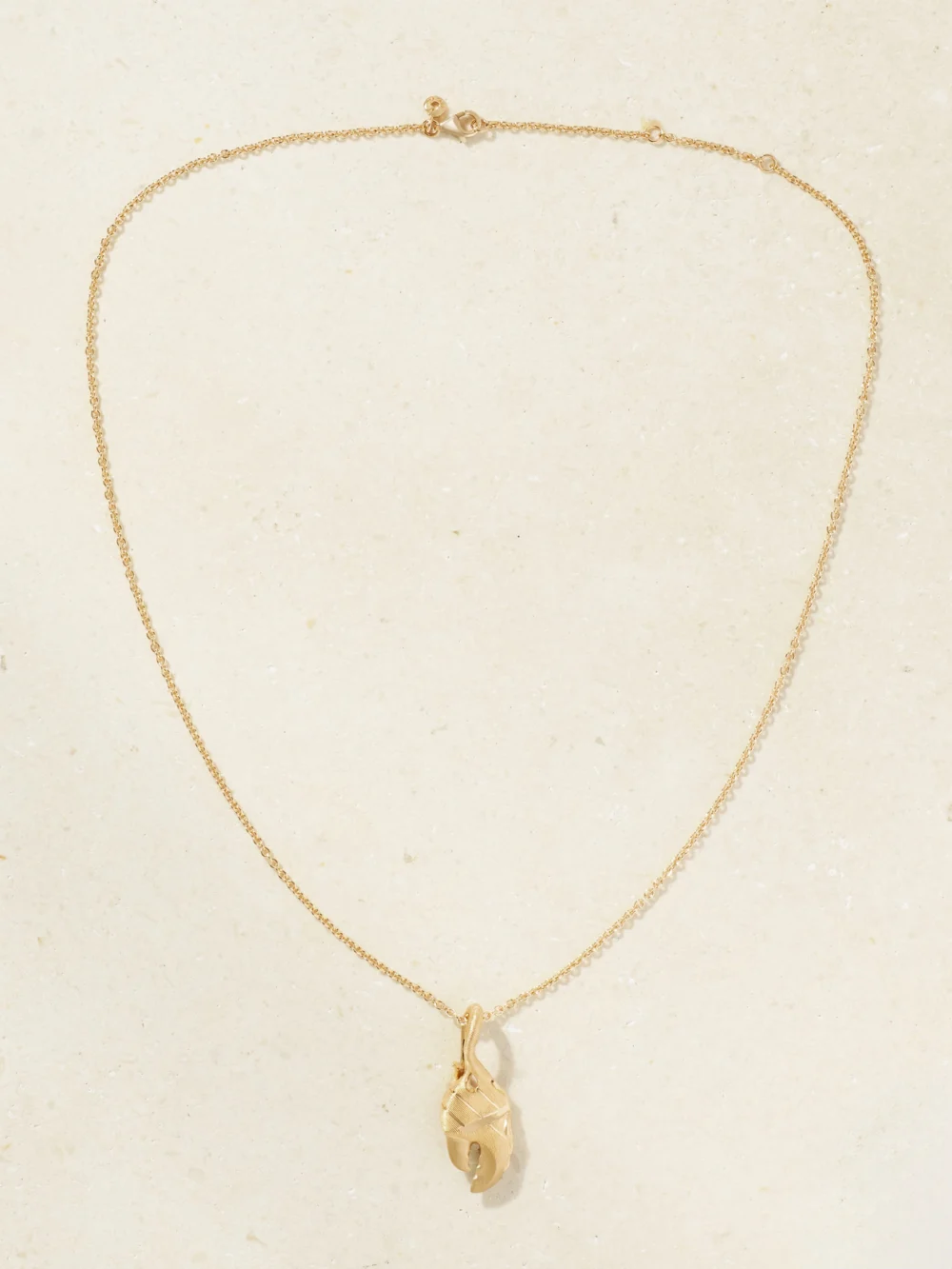 Close-up detail of the Ole Lynggaard Copenhagen Young Fish Claw 18-karat Gold Necklace