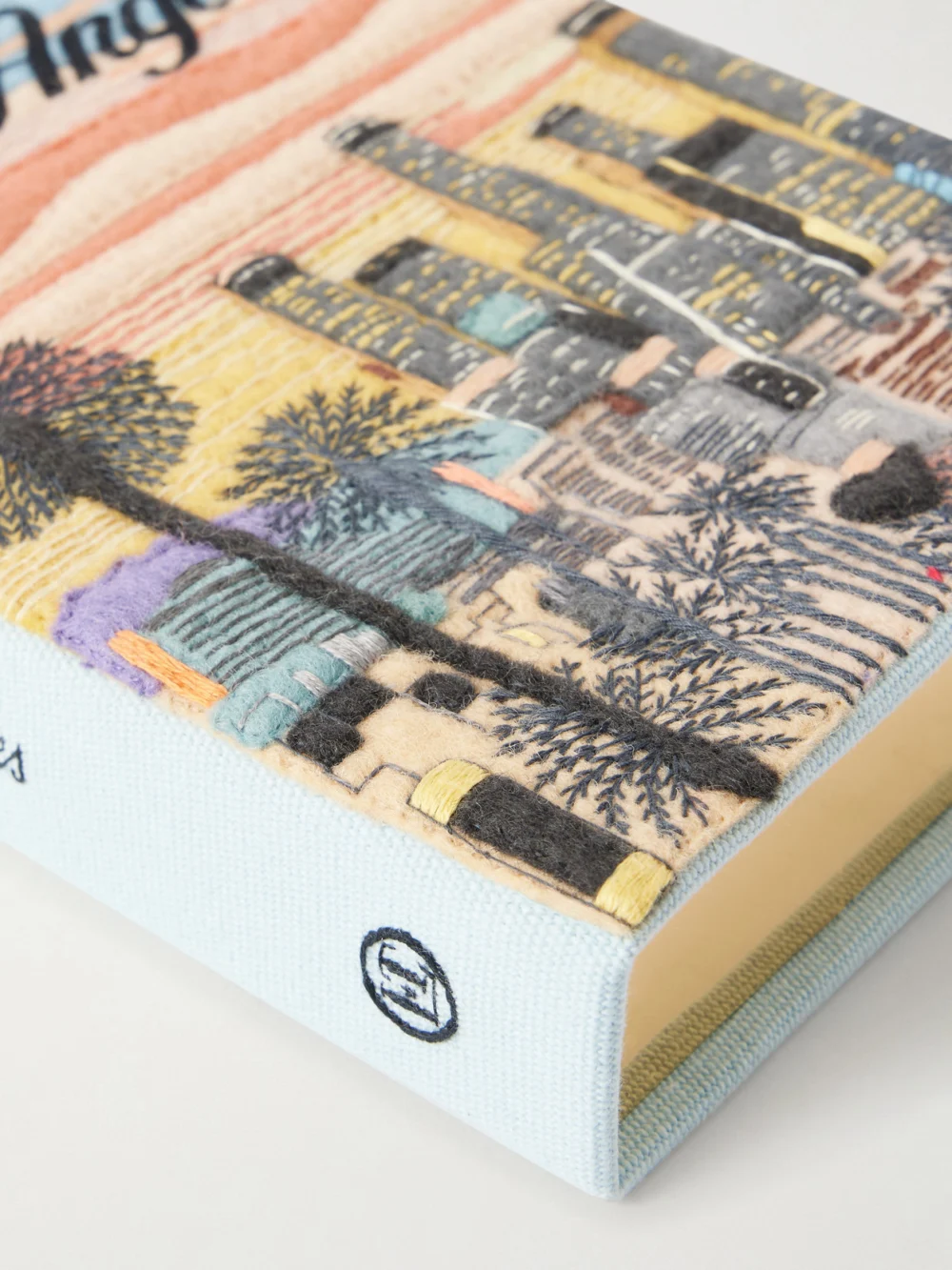 Close-up detail of the Olympia Le-Tan Los Angeles Appliquéd Embroidered Canvas Clutch