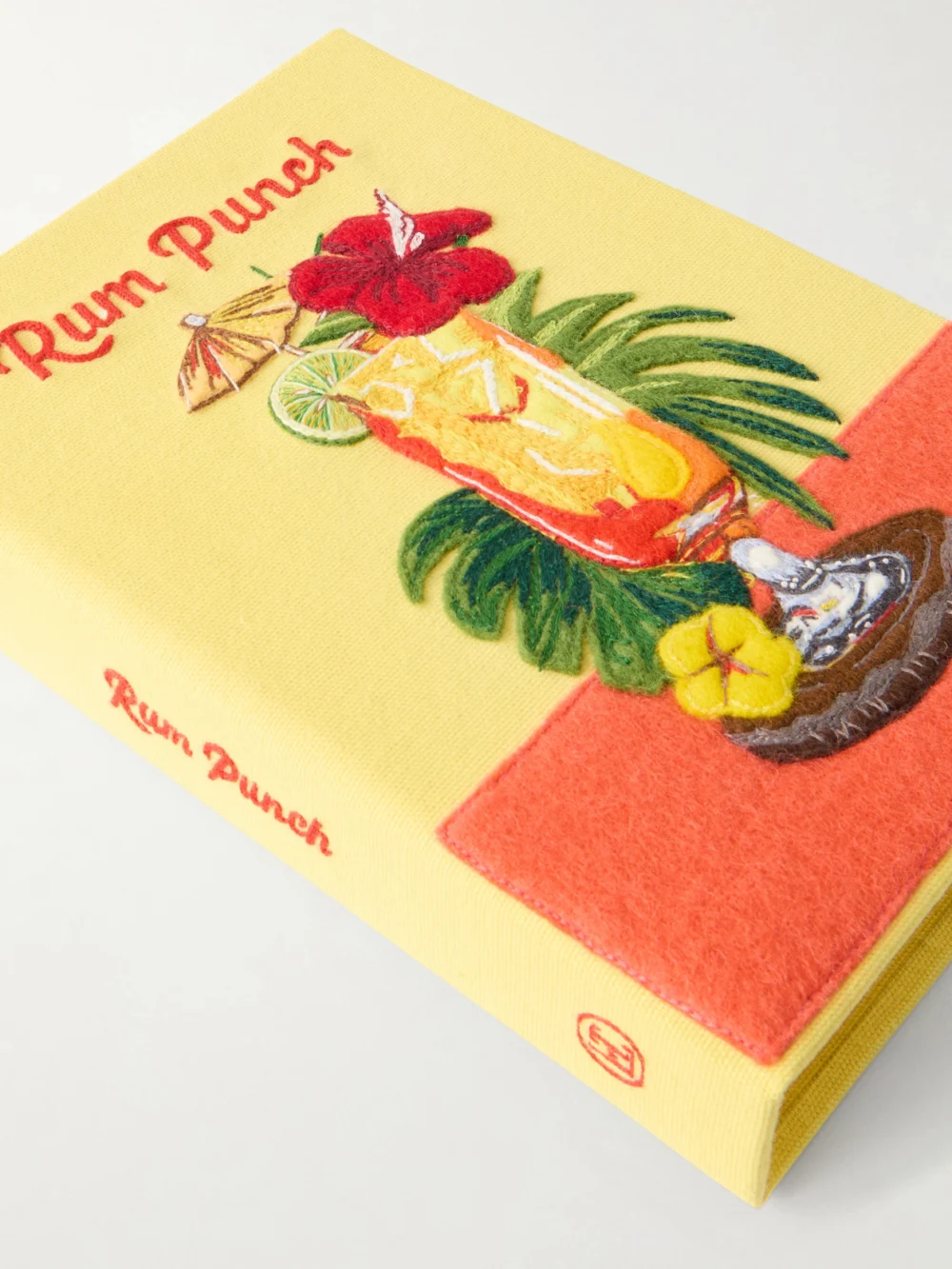 Close-up detail of the Olympia Le-Tan Rum Punch Appliquéd Embroidered Canvas Clutch