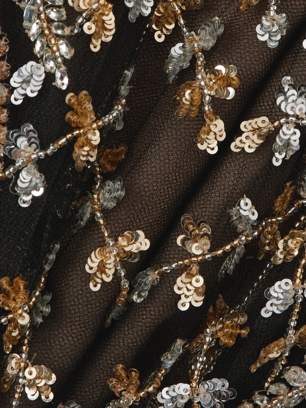 Close-up detail of the Oscar de la Renta Crystal, Bead and Sequin-embellished Pleated Tulle Midi Dress
