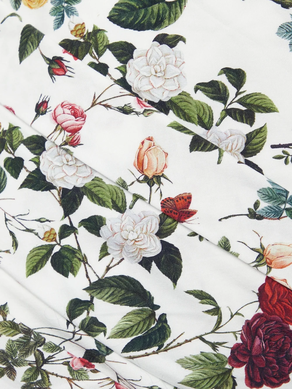 Close-up detail of the Oscar de la Renta Off-the-shoulder Ruched Floral-print Cotton-blend Mini Dress