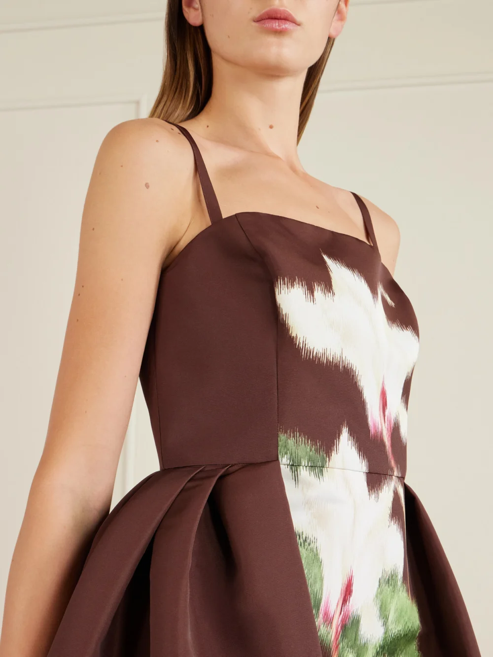 Close-up detail of the Oscar de la Renta Pleated Floral-print Faille Midi Dress