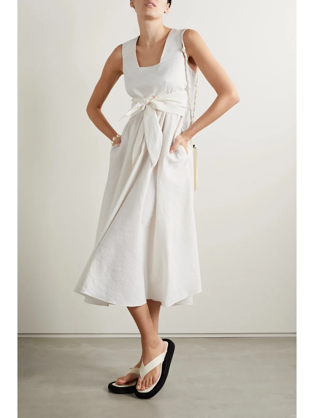 Partow Carina Belted Crinkled-crepe Midi Dress, worn by a model