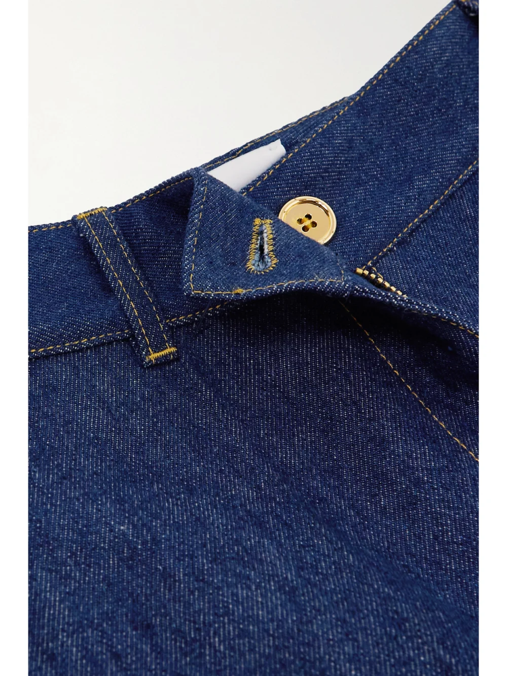 Close-up detail of the Patou High-rise Wide-leg Organic Jeans