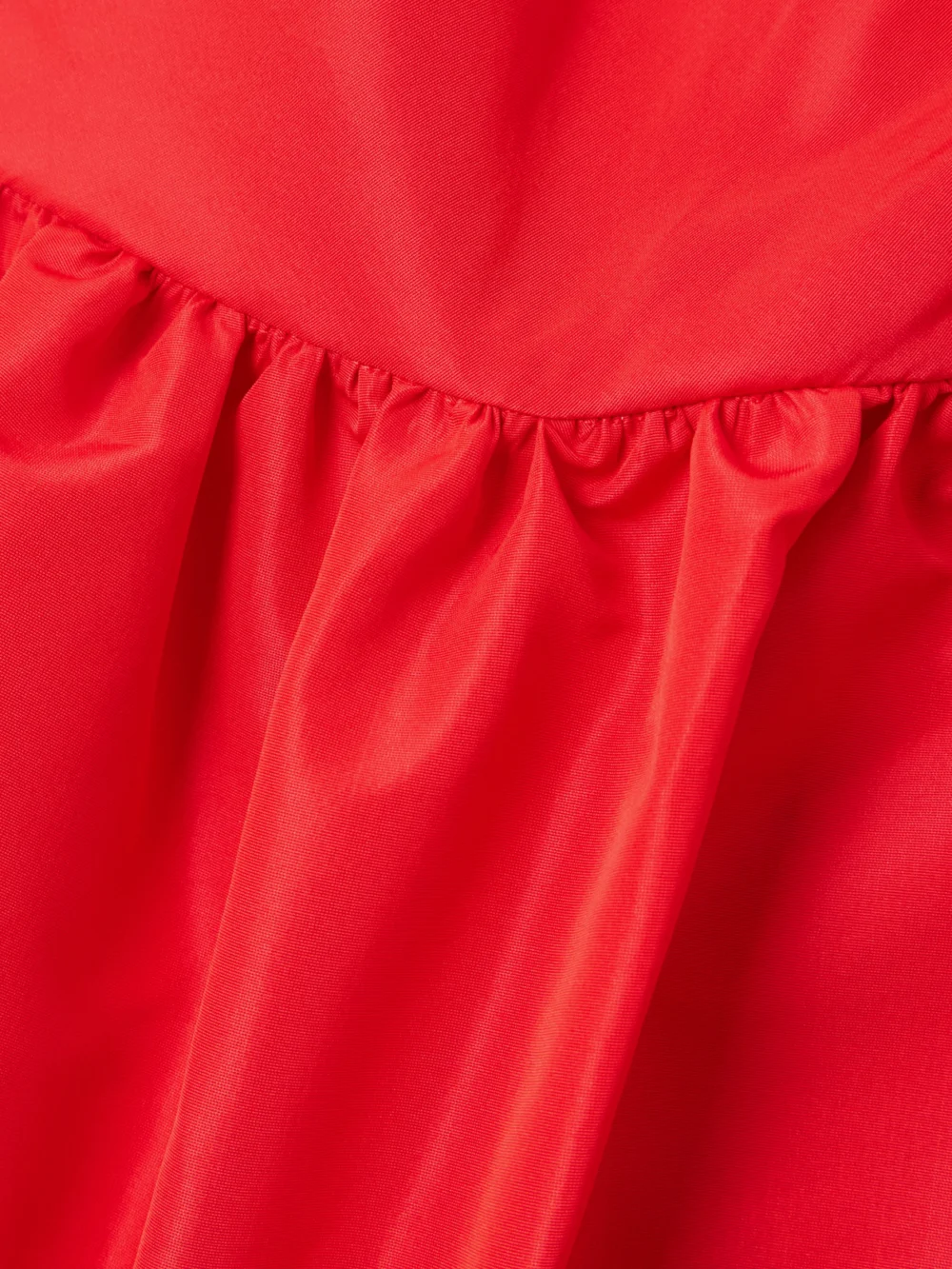 Close-up detail of the Patou One-shoulder Recycled-faille Mini Dress