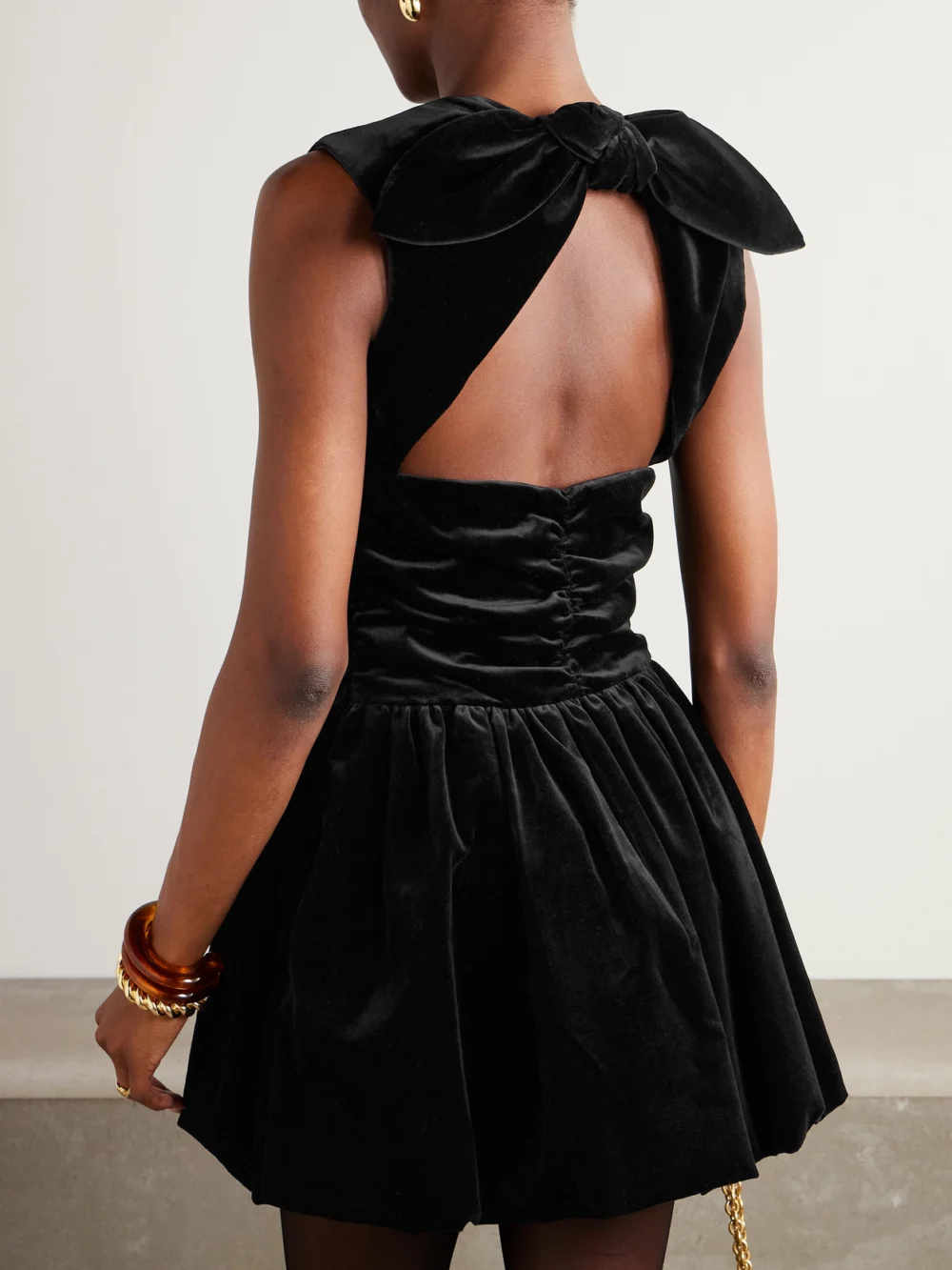 Back view of the Patou Open-back Ruched Cotton-velvet Mini Dress
