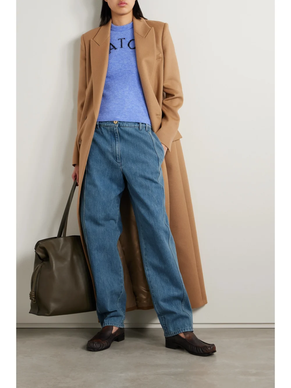 Patou Paneled Mid-rise Straight-leg Jeans, worn by a model