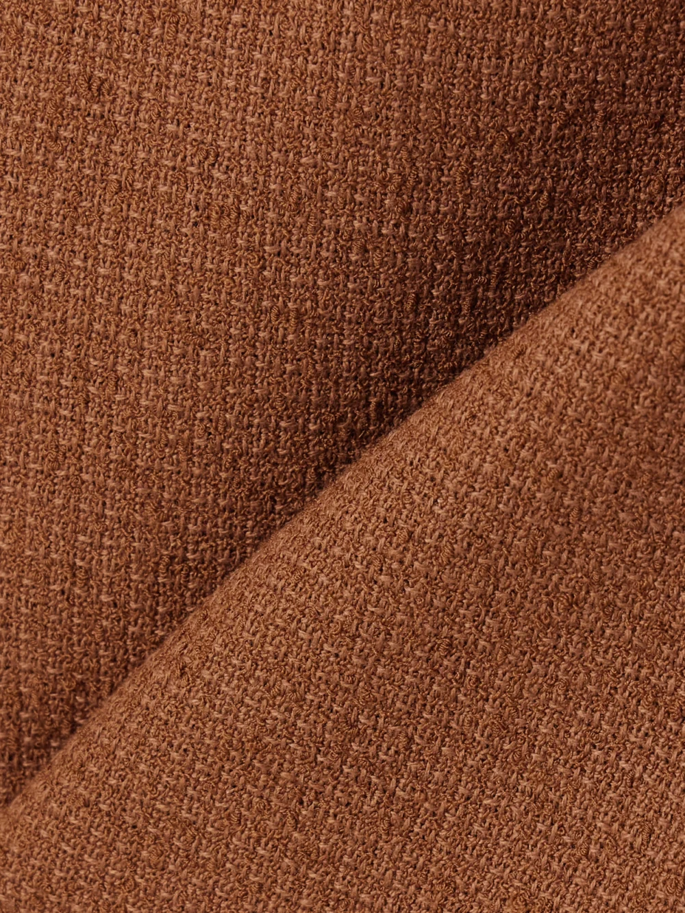 Close-up detail of the Patou Wool-blend Tweed Mini Skirt