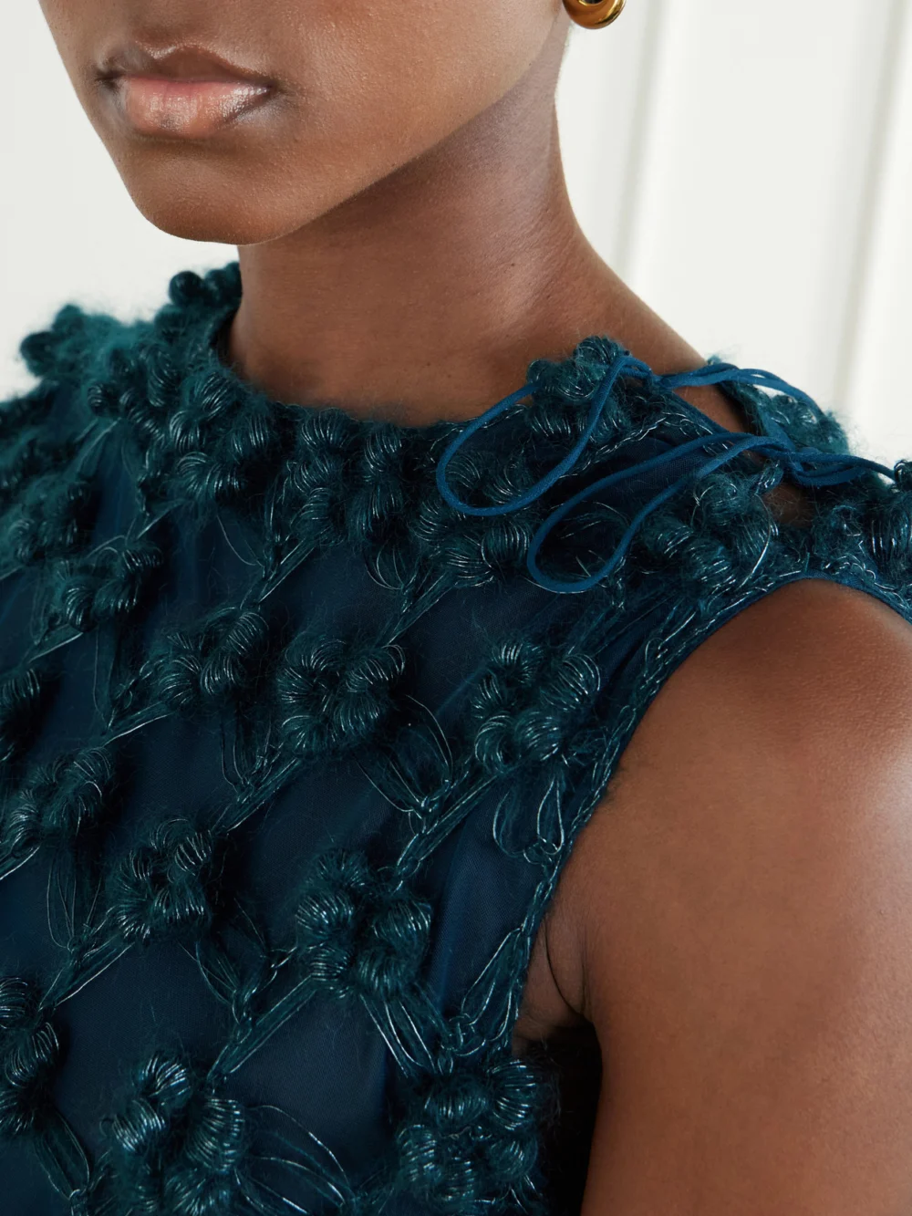 Close-up detail of the Pauline Dujancourt Amber Layered Floral-appliquéd Crochet and Organza Mini Dress