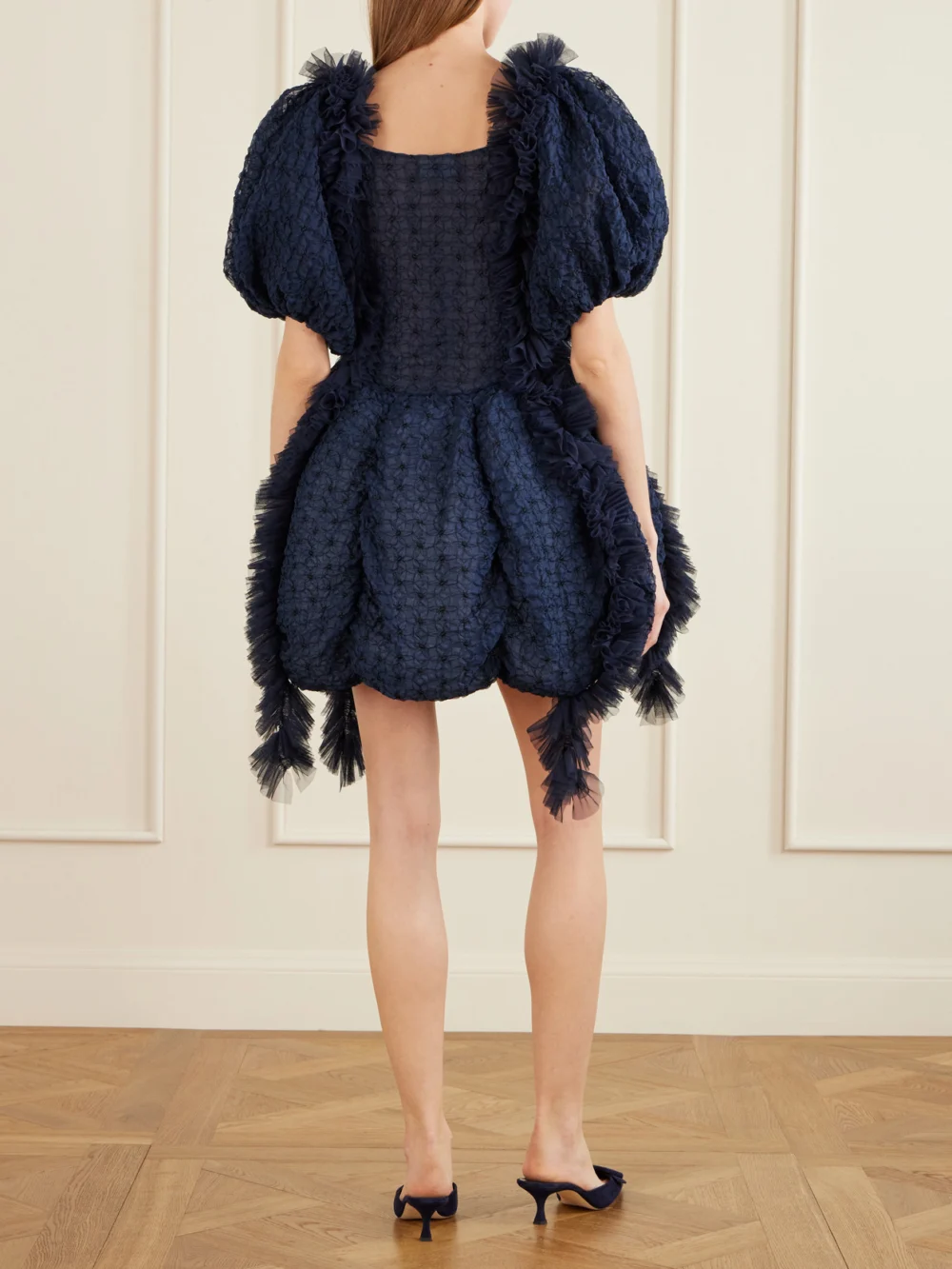 Back view of the Pauline Dujancourt Flower Smocked Recycled-organza Mini Dress
