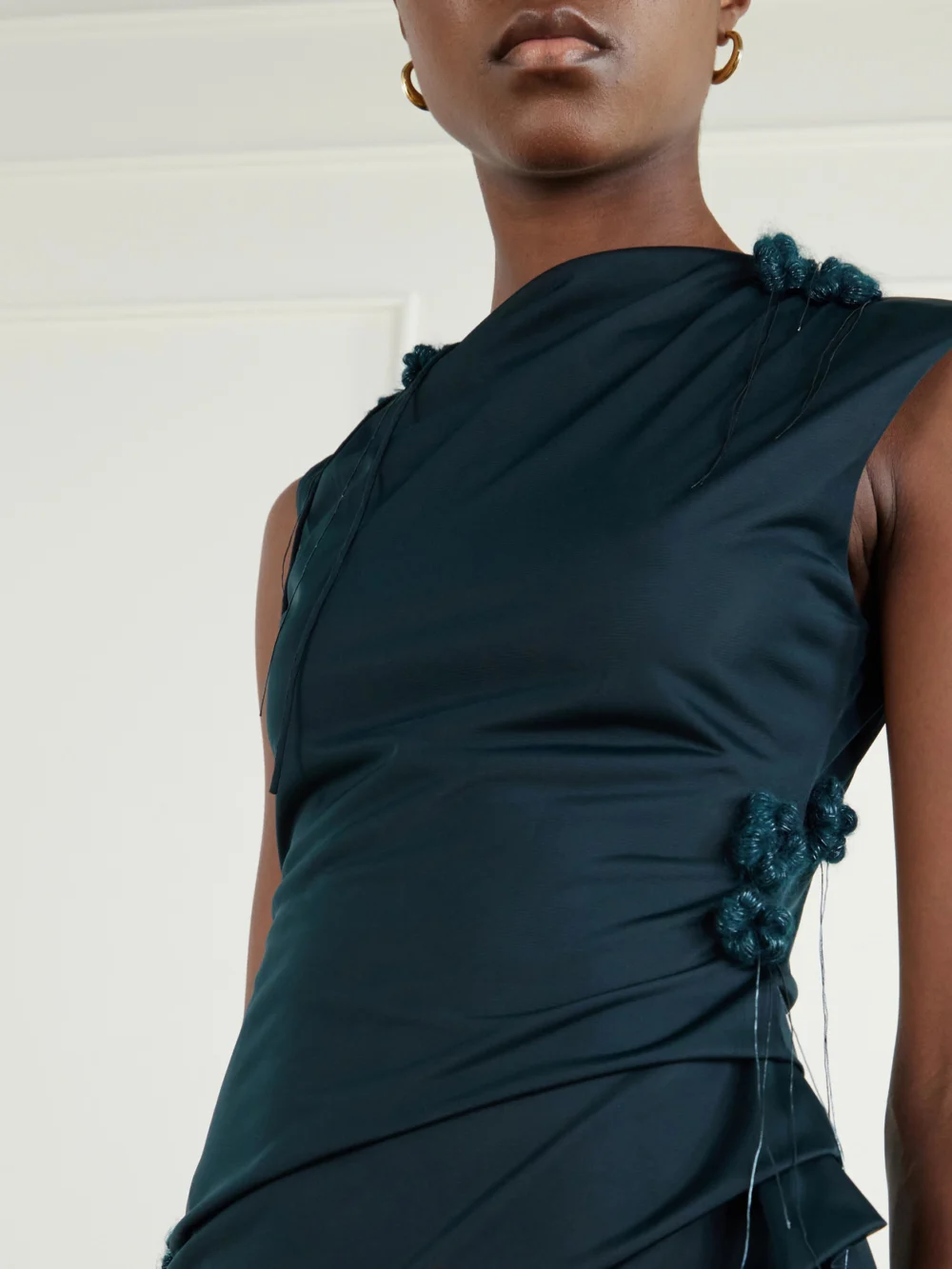 Close-up detail of the Pauline Dujancourt Najia Floral-appliquéd Gathered Asymmetric Jersey Midi Dress