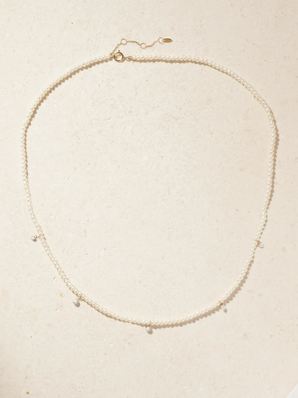 Close-up detail of the Persée 18-karat Gold, Pearl and Diamond Necklace
