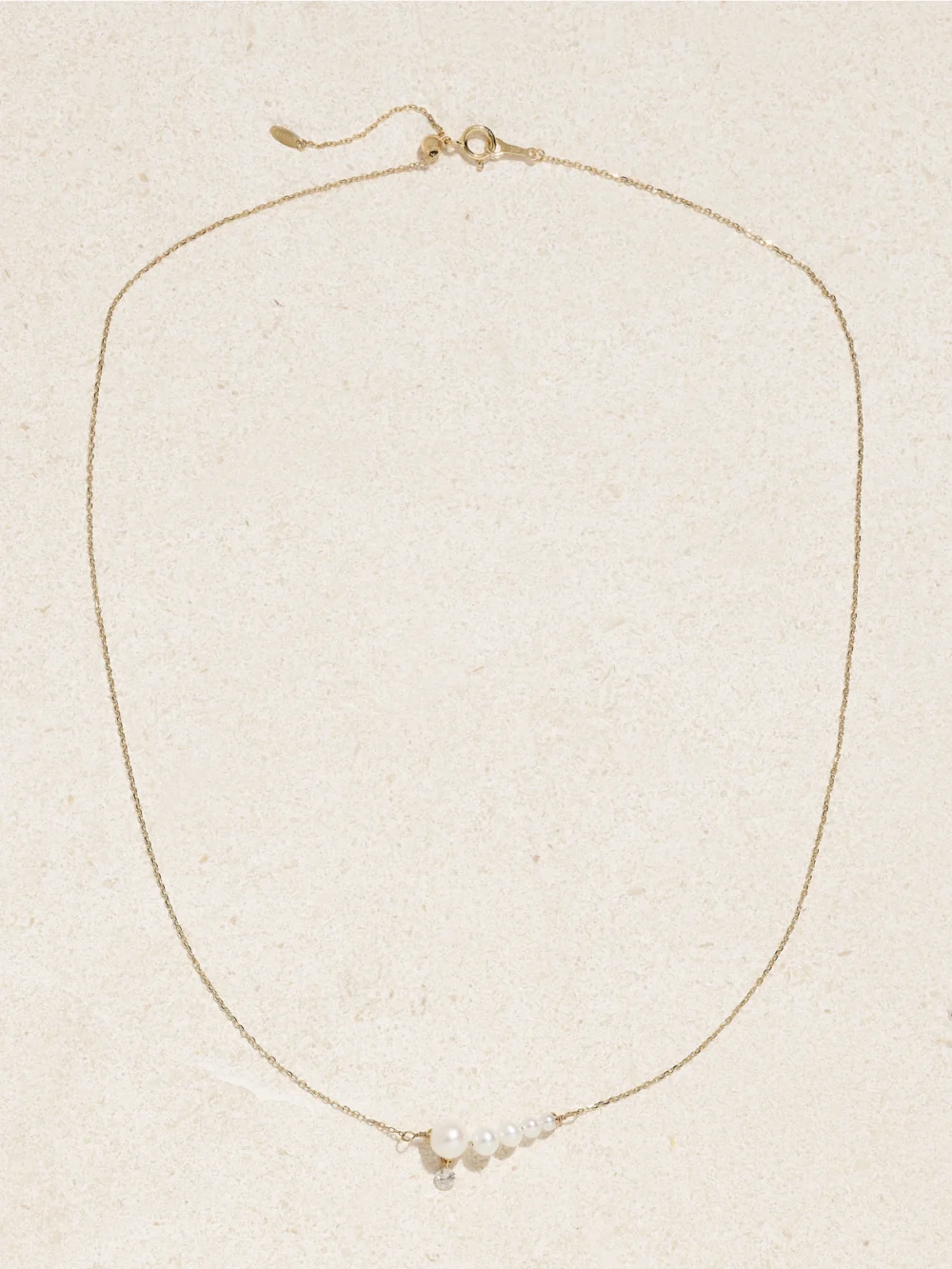 Close-up detail of the Persée 18-karat Gold, Pearl and Diamond Necklace