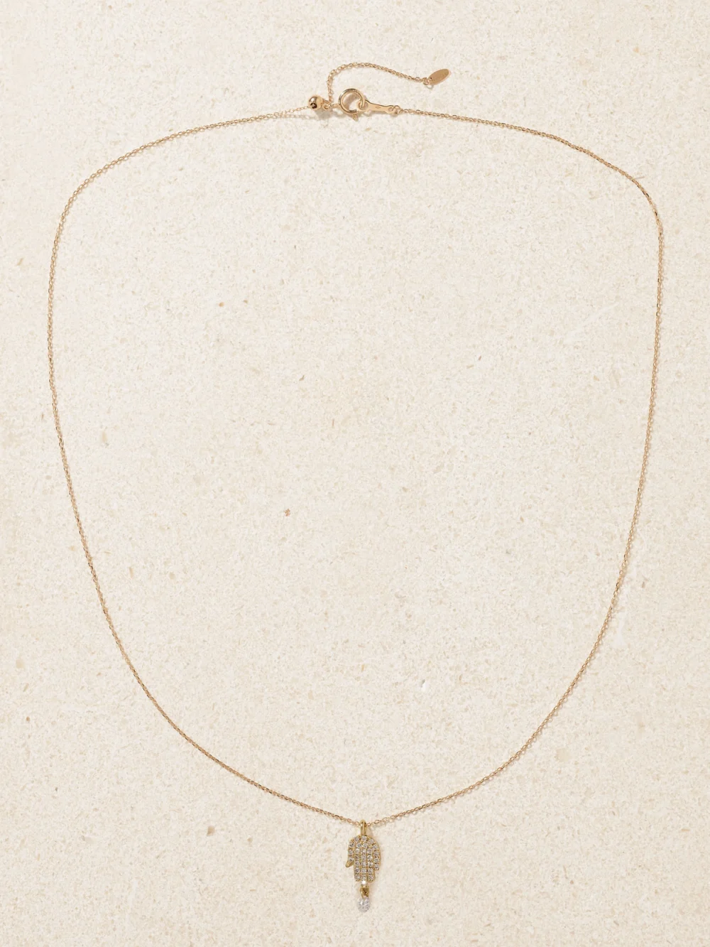 Close-up detail of the Persée Hand of Fatima 18-karat Gold Diamond Necklace