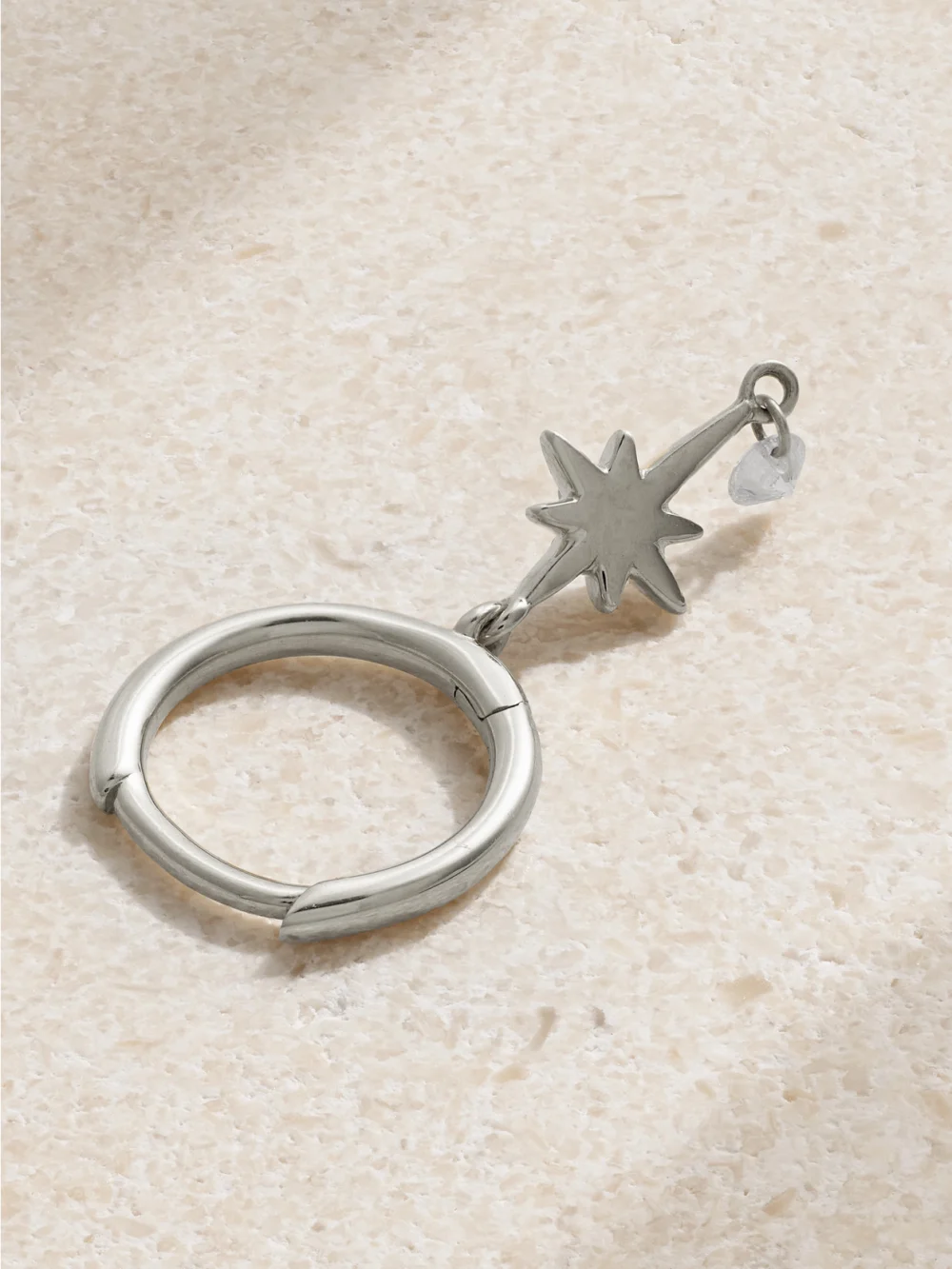 Close-up detail of the Persée North Star 18-karat White Gold Diamond Single Hoop Earring