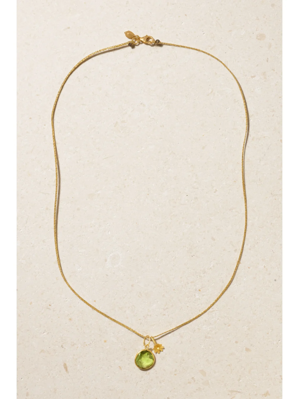 Close-up detail of the Pippa Small 18-karat Gold, Cord and Peridot Necklace