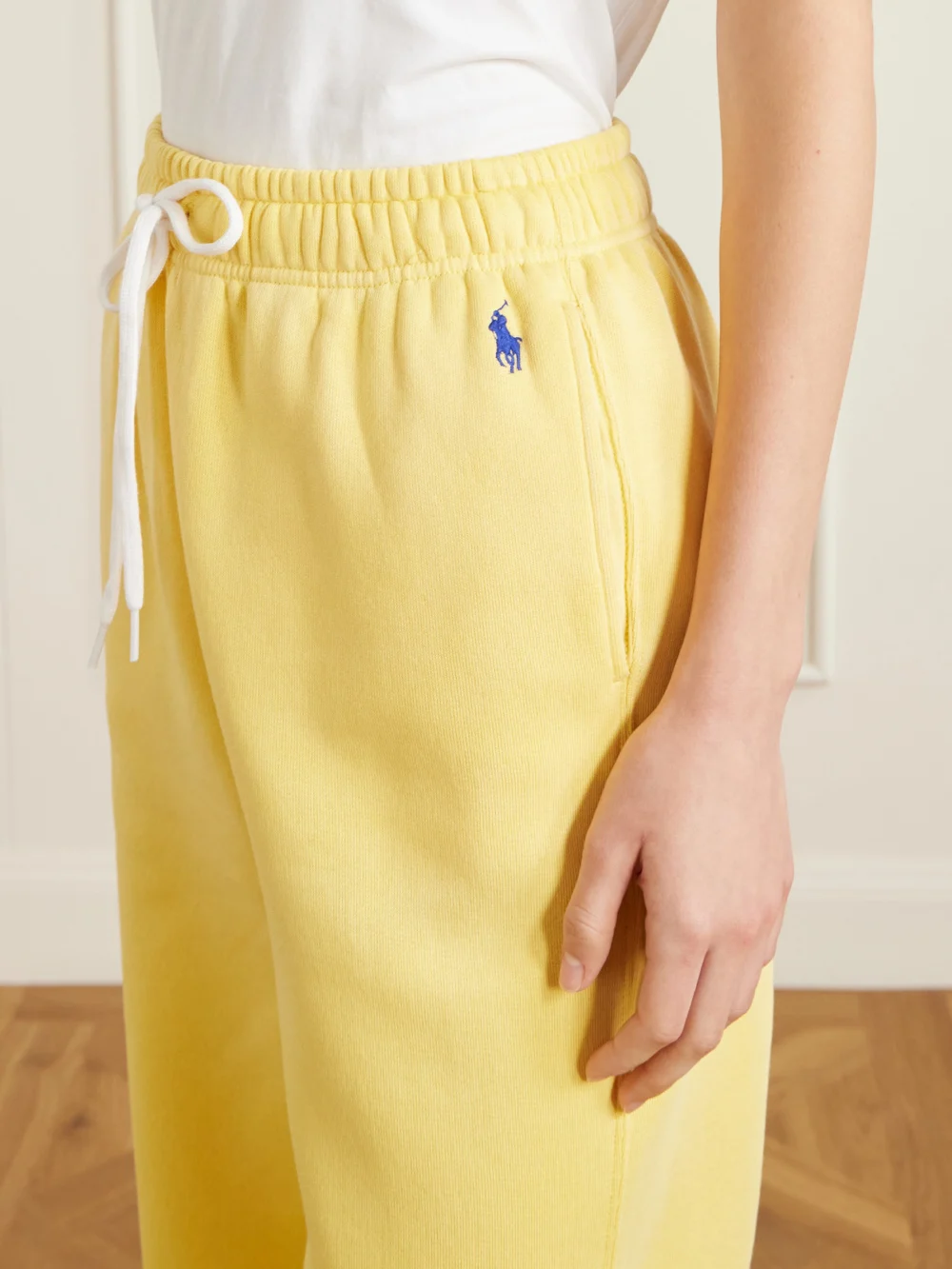Close-up detail of the Polo Ralph Lauren Embroidered Cotton-blend Fleece Tapered Sweatpants