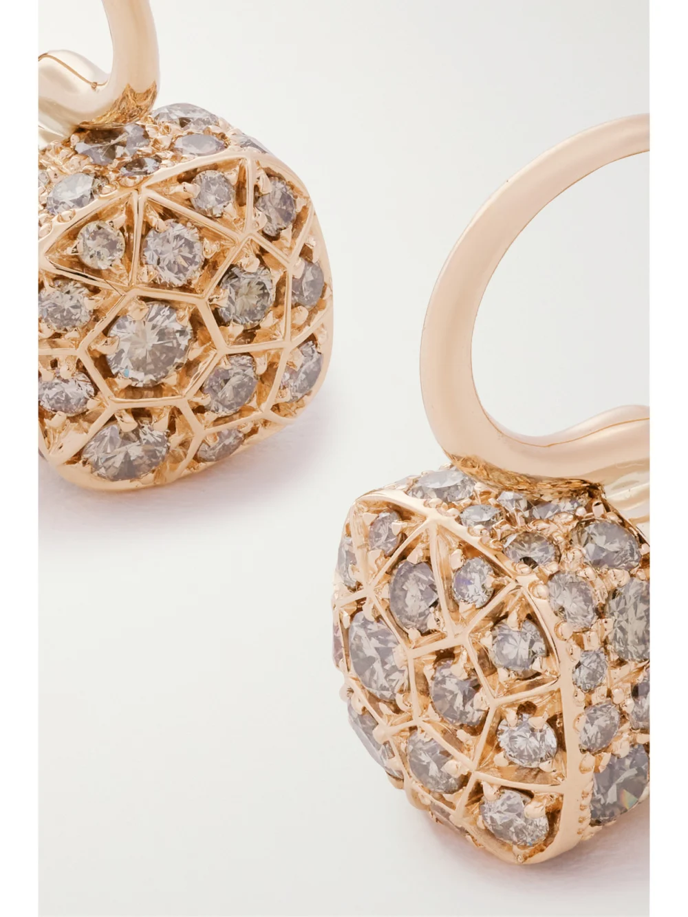 Close-up detail of the Pomellato Nudo Petit 18-karat Rose and White Gold Diamond Earrings