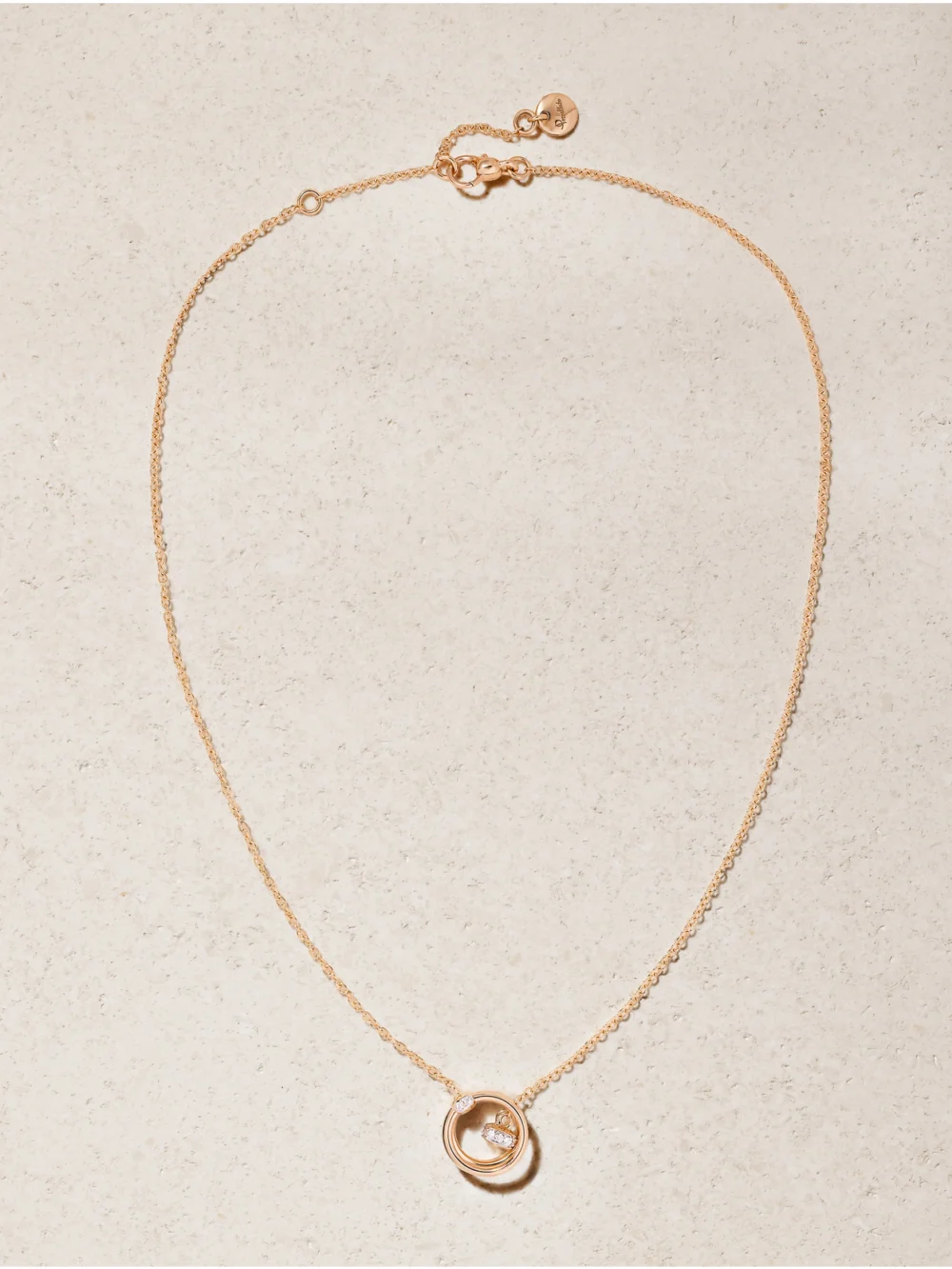 Close-up detail of the Pomellato Together Rhodium-plated 18-karat Rose Gold Diamond Necklace