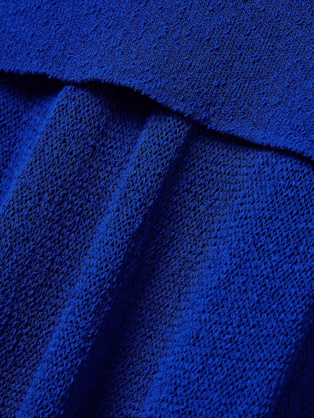 Close-up detail of the Proenza Schouler Anita Layered Knitted Maxi Dress