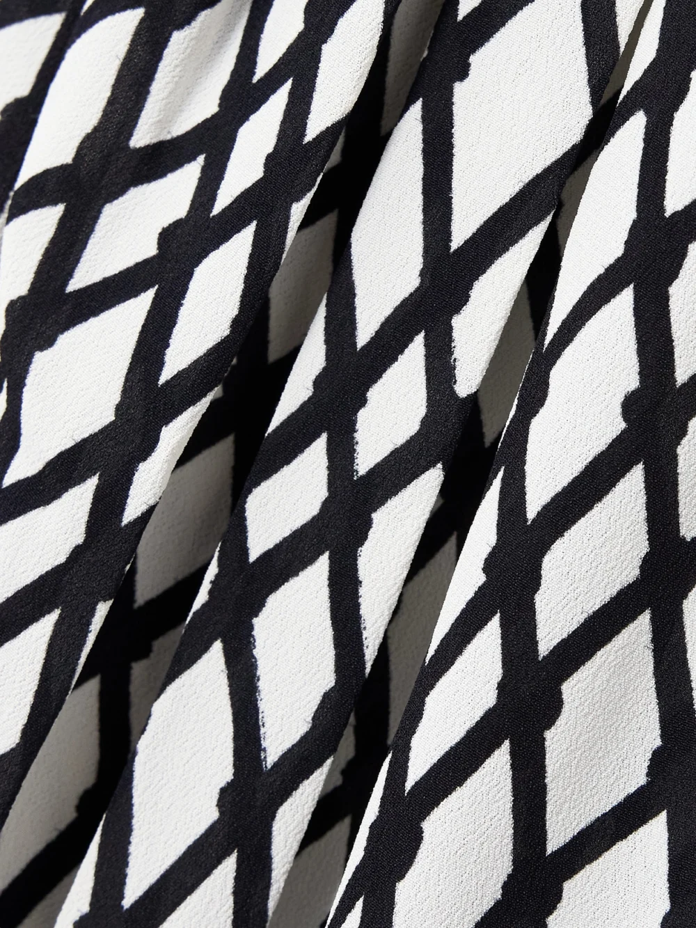 Close-up detail of the Proenza Schouler Bailey Belted Printed Crepe Midi Dress