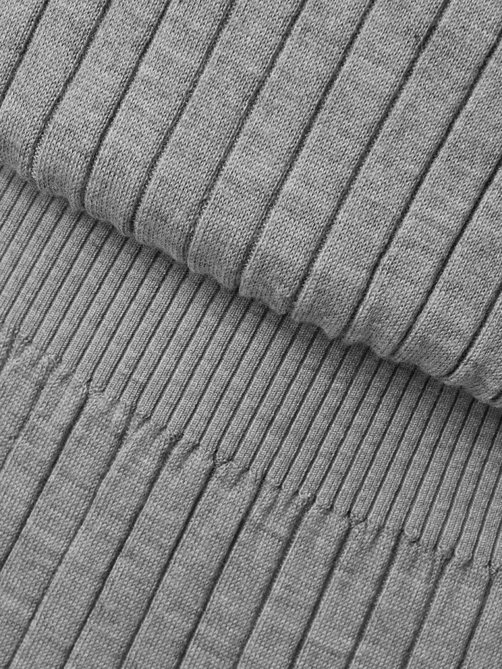 Close-up detail of the Proenza Schouler Eden Reversible Ribbed Wool and Silk-blend Midi Dress