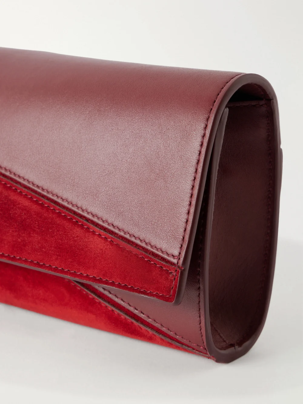 Close-up detail of the Proenza Schouler Hex Leather and Suede Clutch