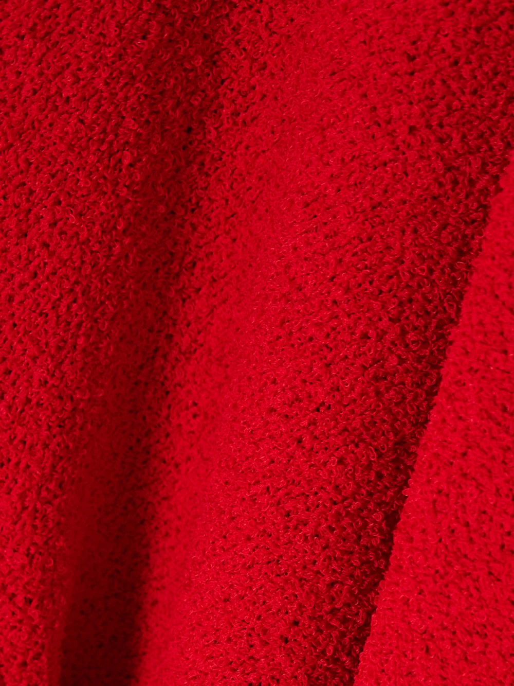Close-up detail of the Proenza Schouler Lara Convertible Cutout Bouclé Maxi Dress