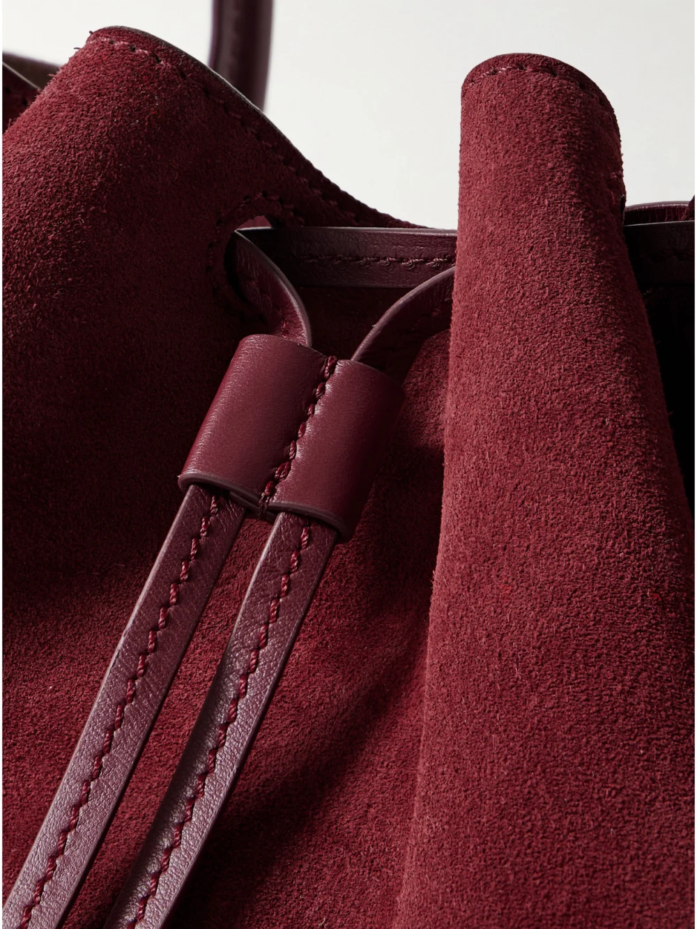 Close-up detail of the Proenza Schouler Large Leather-trimmed Ruched Suede Tote