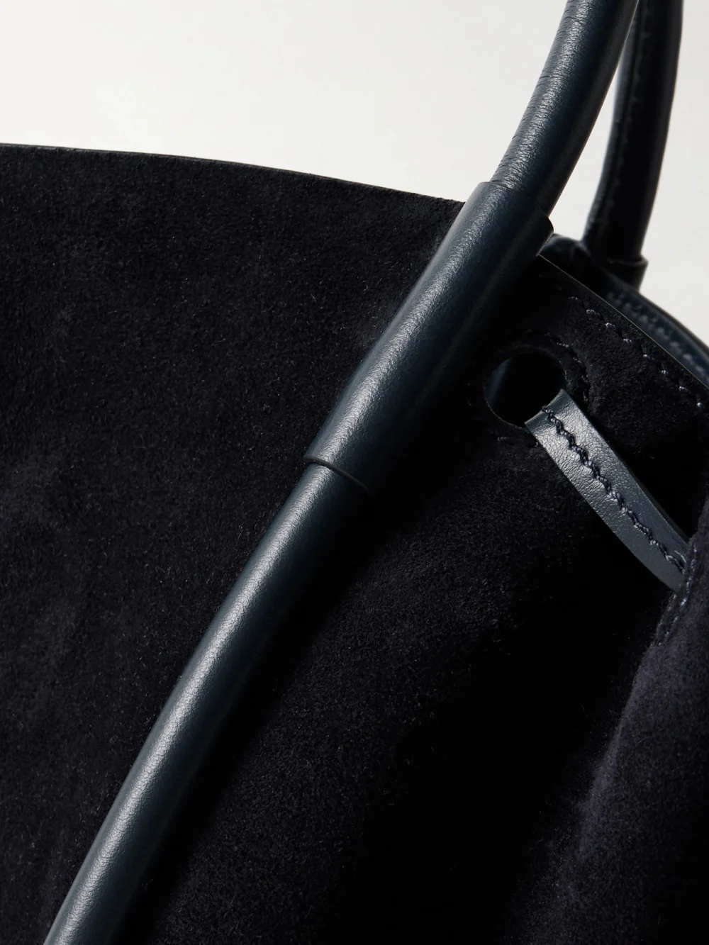 Close-up detail of the Proenza Schouler Large Leather-trimmed Ruched Suede Tote