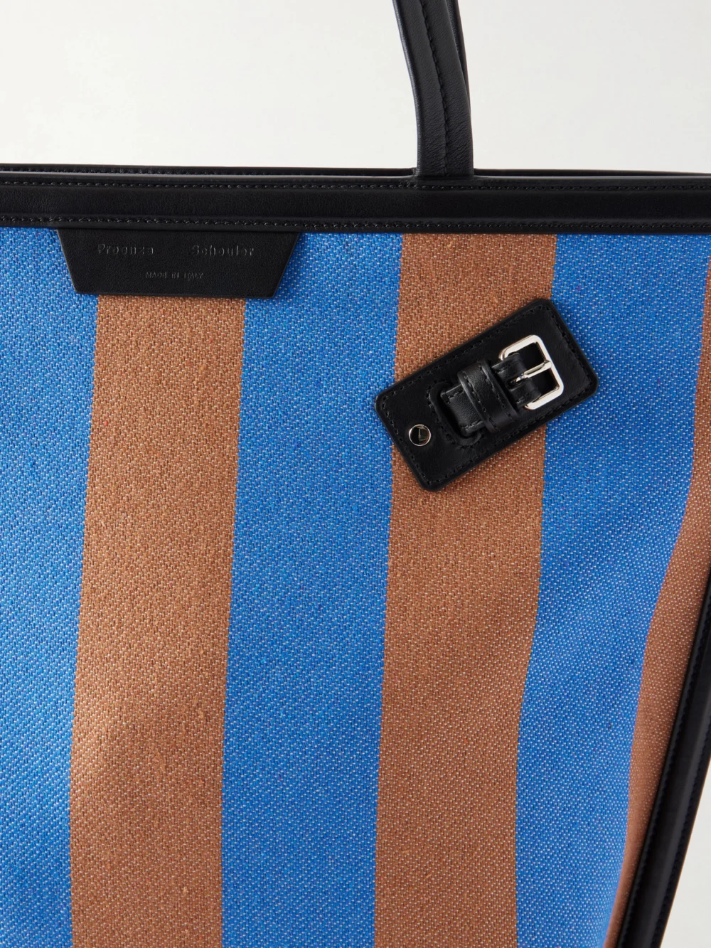 Close-up detail of the Proenza Schouler North South Days Striped Leather-trimmed Canvas Tote