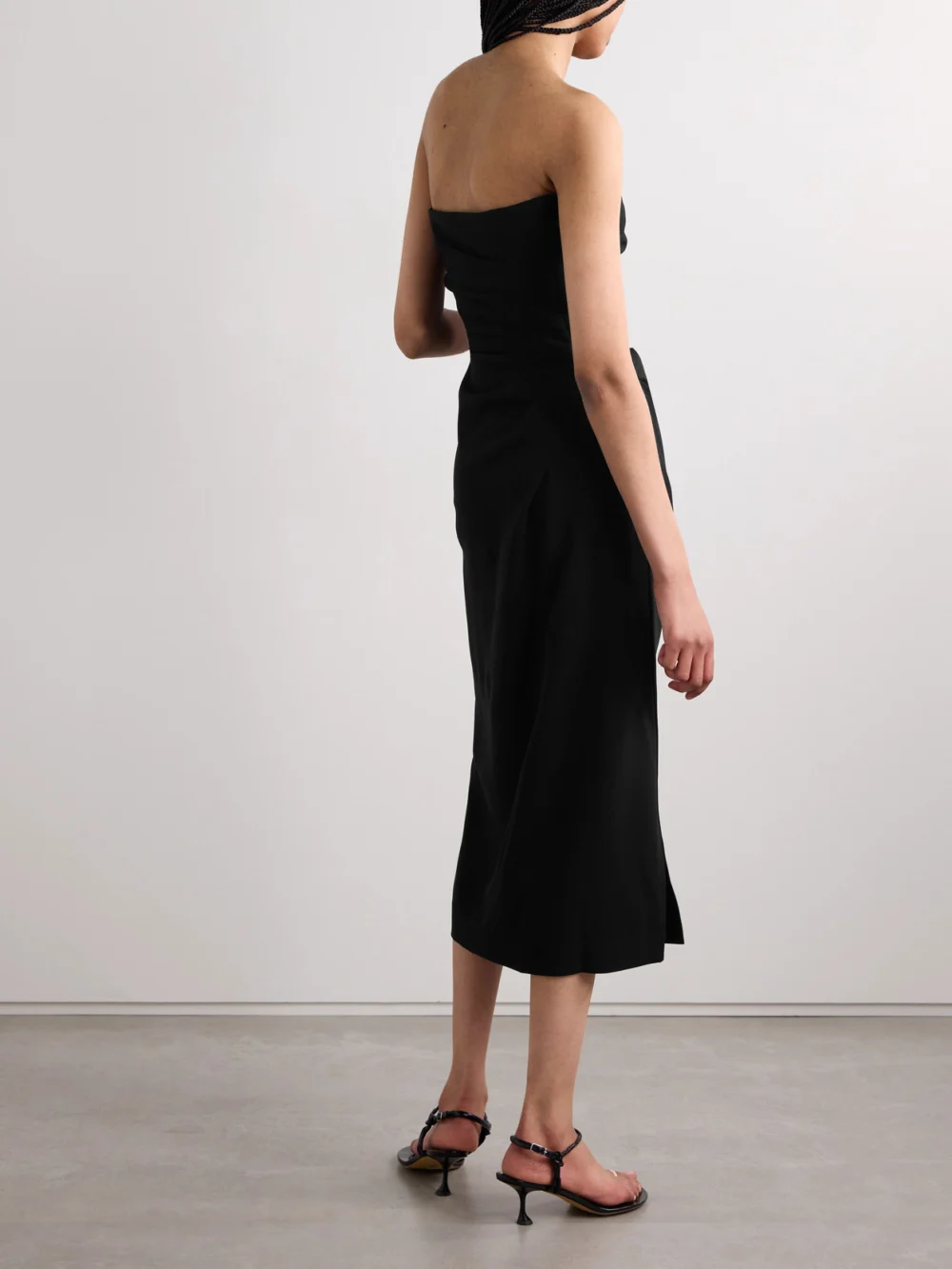 Back view of the Proenza Schouler Shira Draped Strapless Crepe Midi Dress