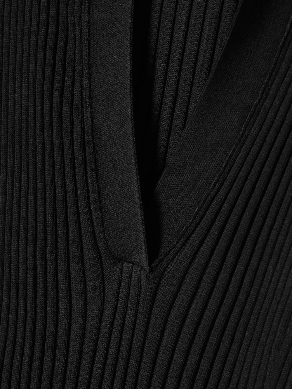 Close-up detail of the Proenza Schouler Tatum Ribbed-knit Midi Dress
