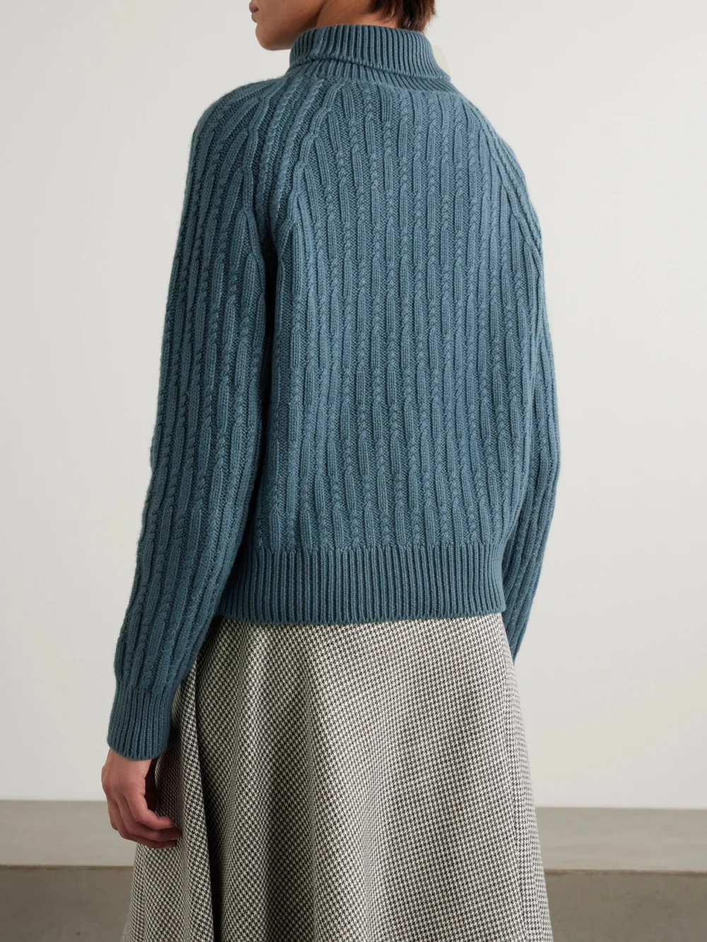 Back view of the Purdey Annabel Cable-knit Cashmere Turtleneck Sweater