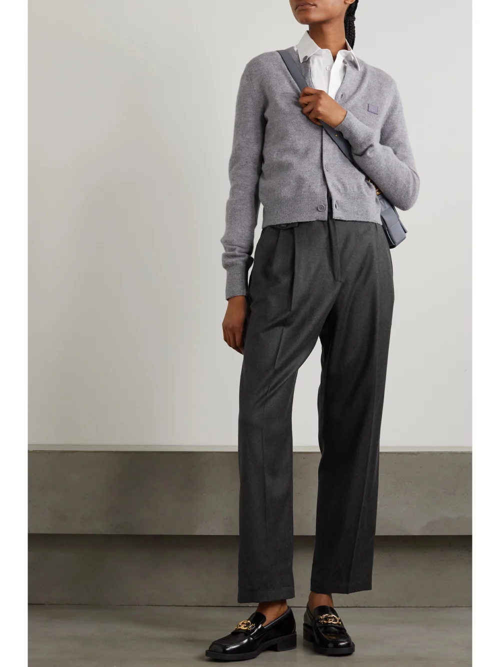 Purdey Cropped Pleated Cotton-flannel Tapered Pants, worn by a model