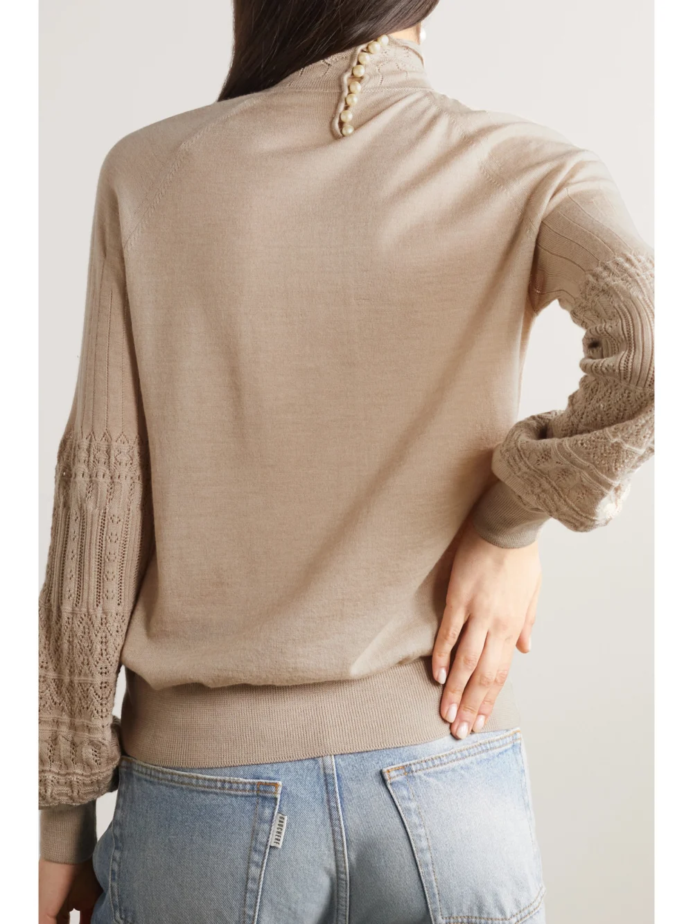 Back view of the Purdey Draped Pointelle-knit Cashmere Sweater