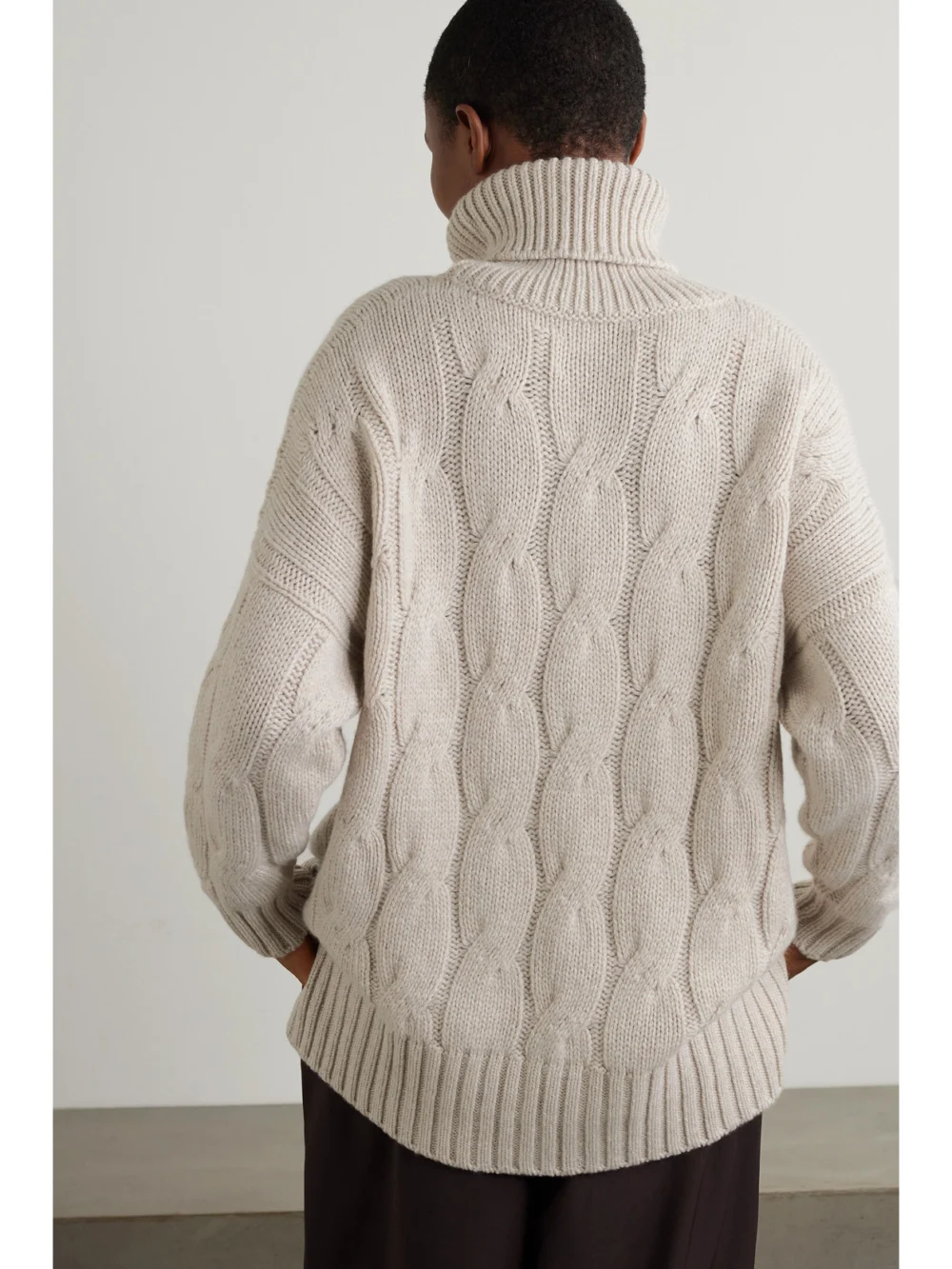 Back view of the Purdey Oversized Cable-knit Cashmere Turtleneck Sweater