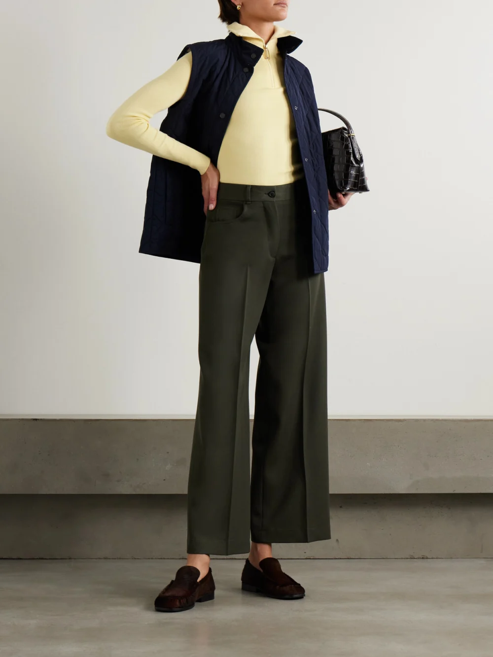 Purdey Seymour Pleated Wool-twill Wide-leg Pants, worn by a model