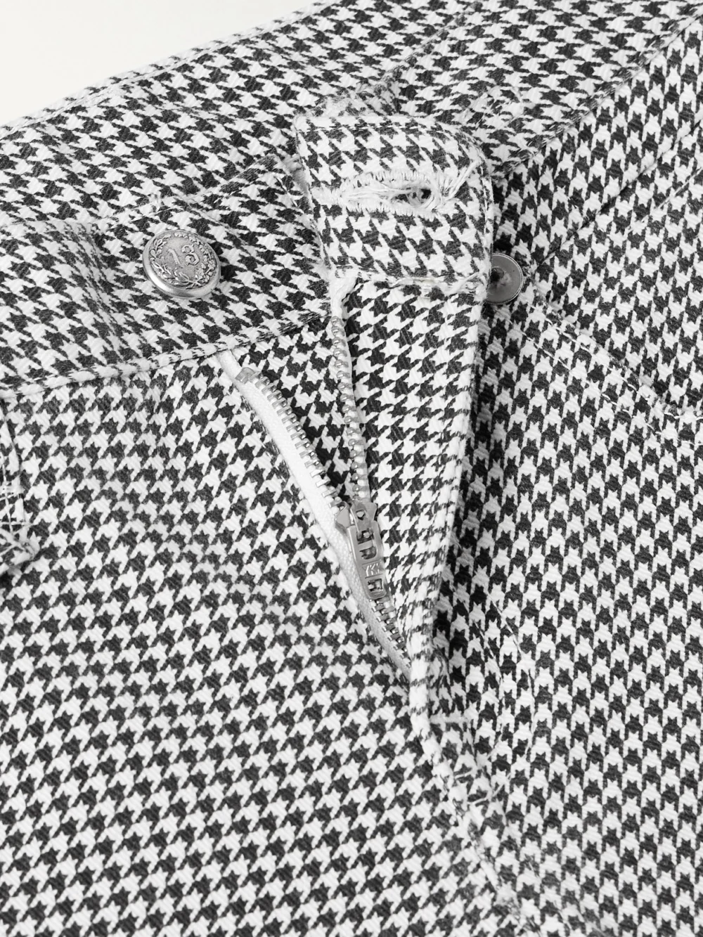 Close-up detail of the R13 Boy Cropped Houndstooth Low-rise Slim-leg Jeans