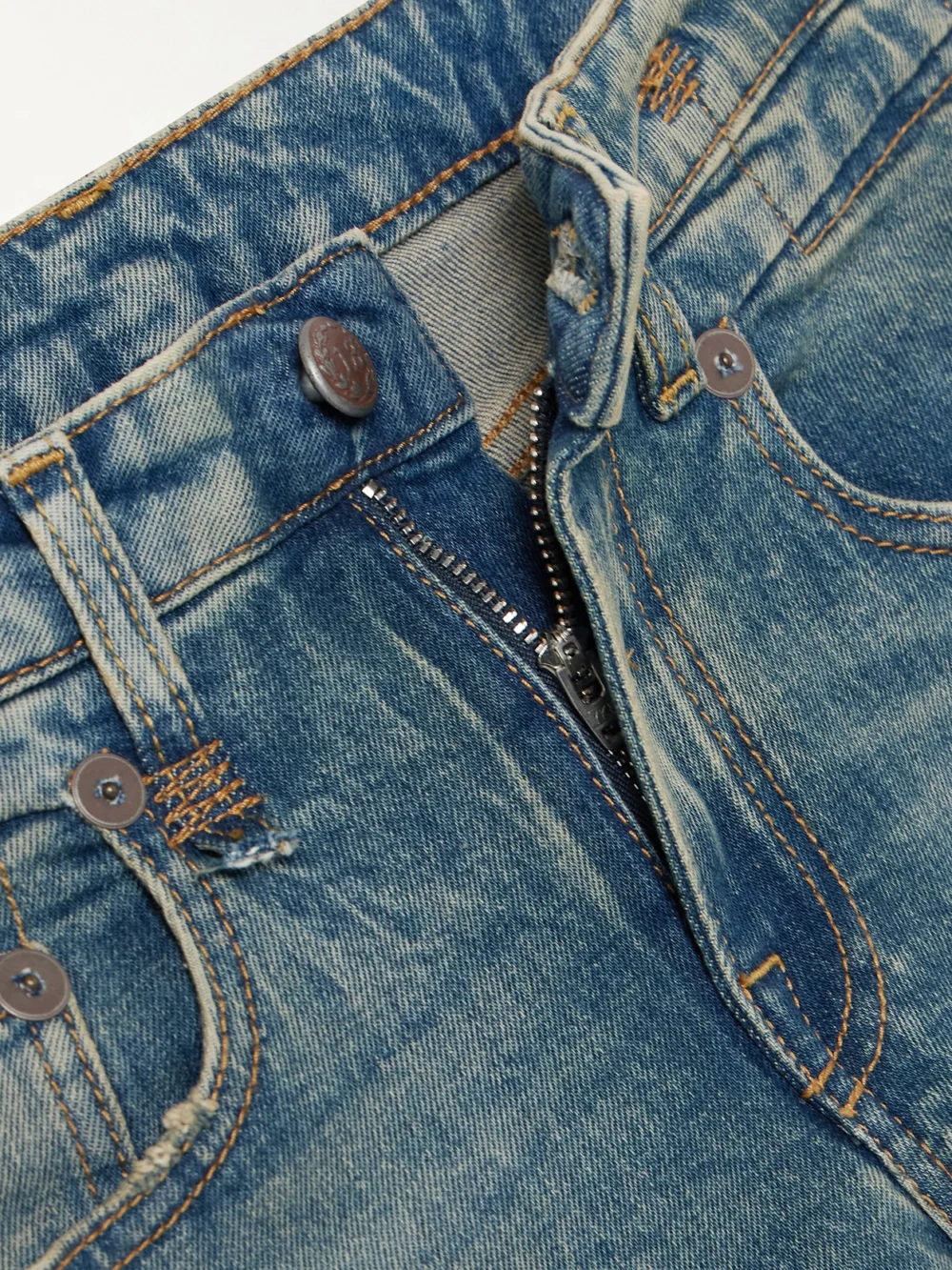 Close-up detail of the R13 Boy Straight Cropped Distressed Low-rise Jeans