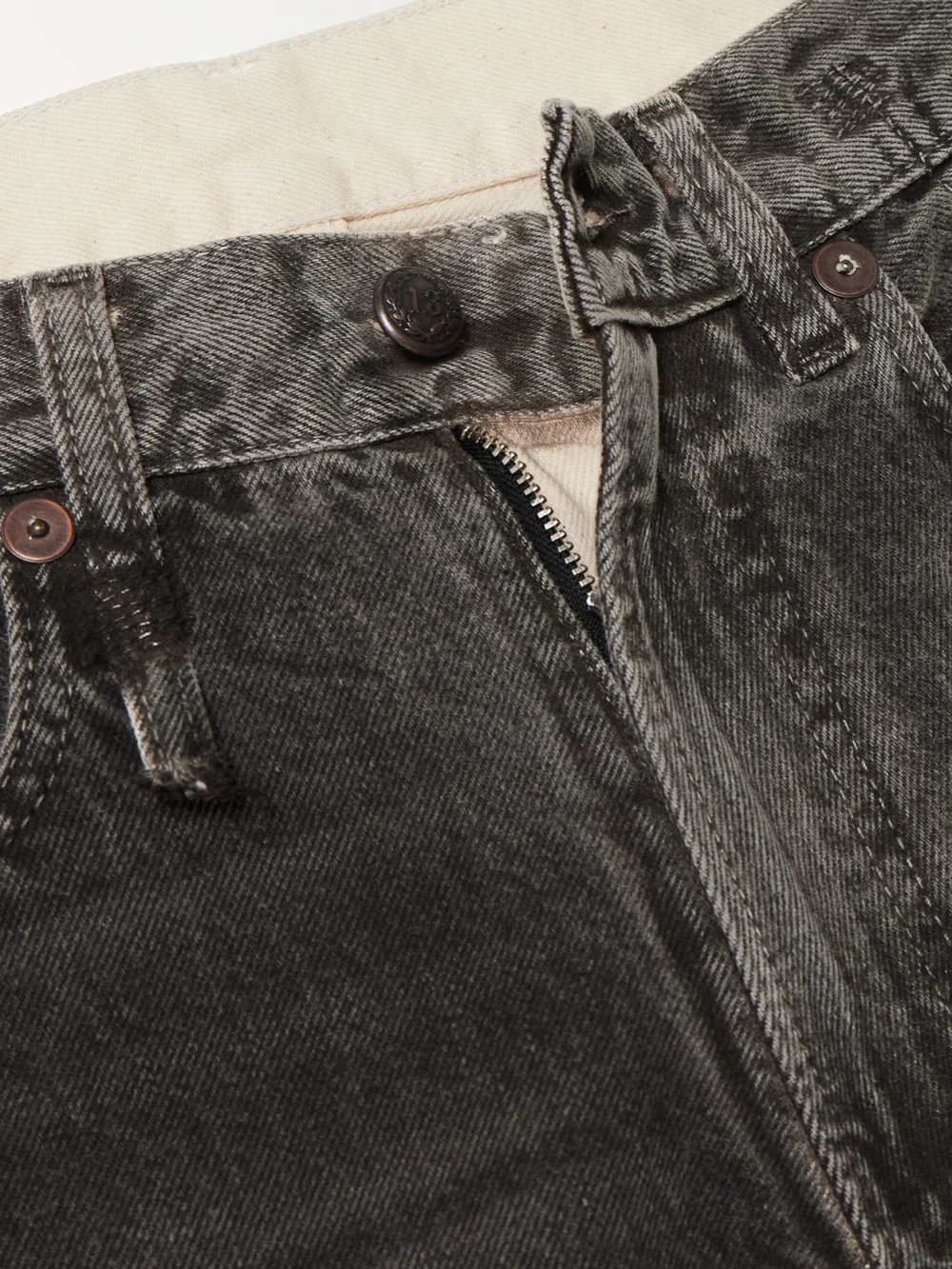 Close-up detail of the R13 Boyfriend Low-rise Wide-leg Jeans
