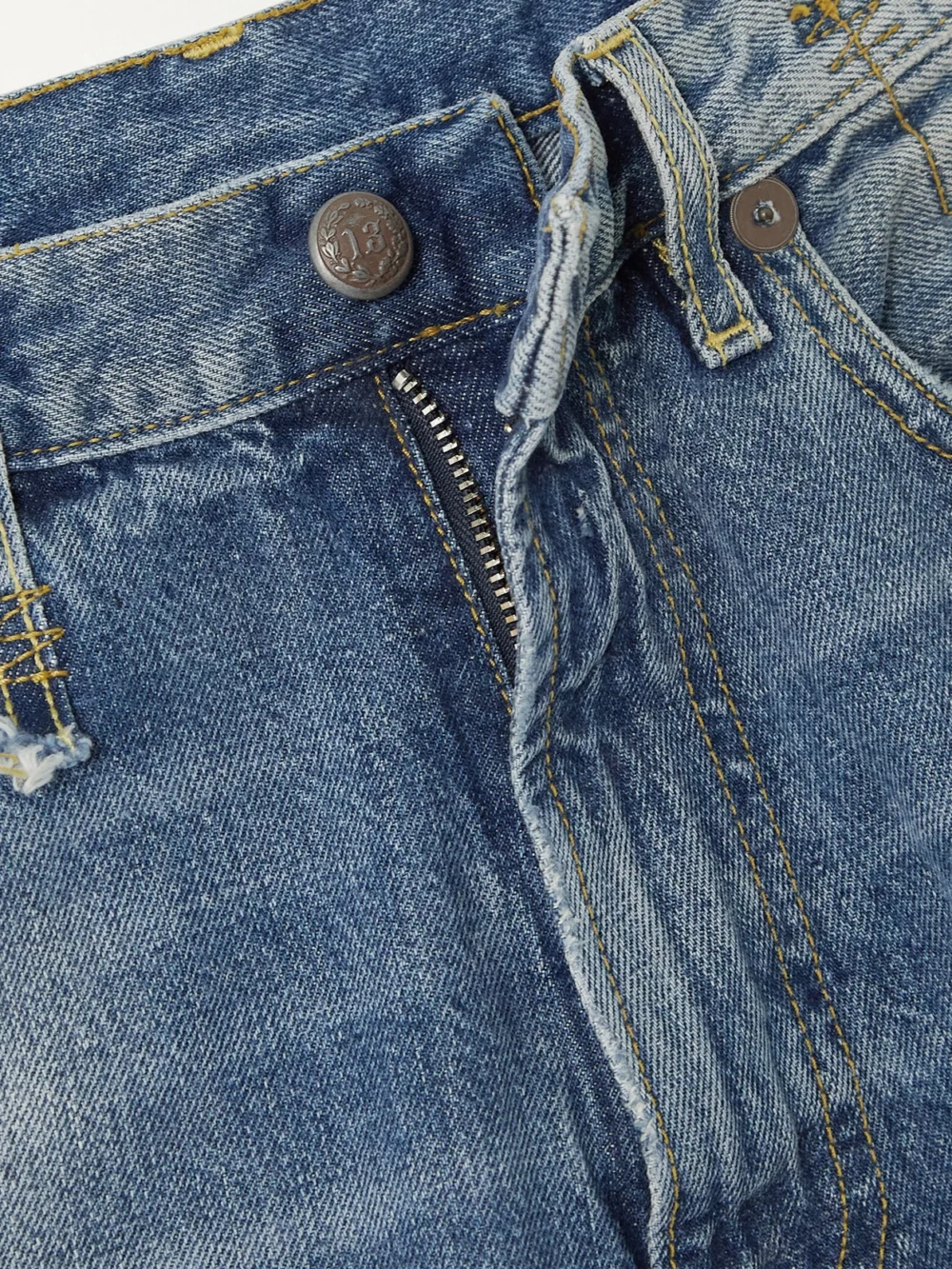 Close-up detail of the R13 Cropped Ankle D'arcy Distressed High-rise Wide-leg Jeans