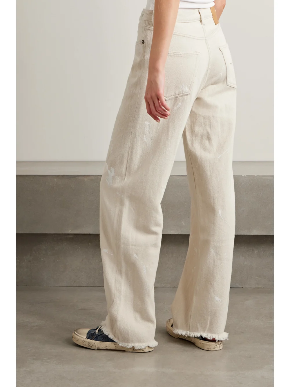 Back view of the R13 D'arcy Paint Splatter Loose High-rise Wide-leg Jeans