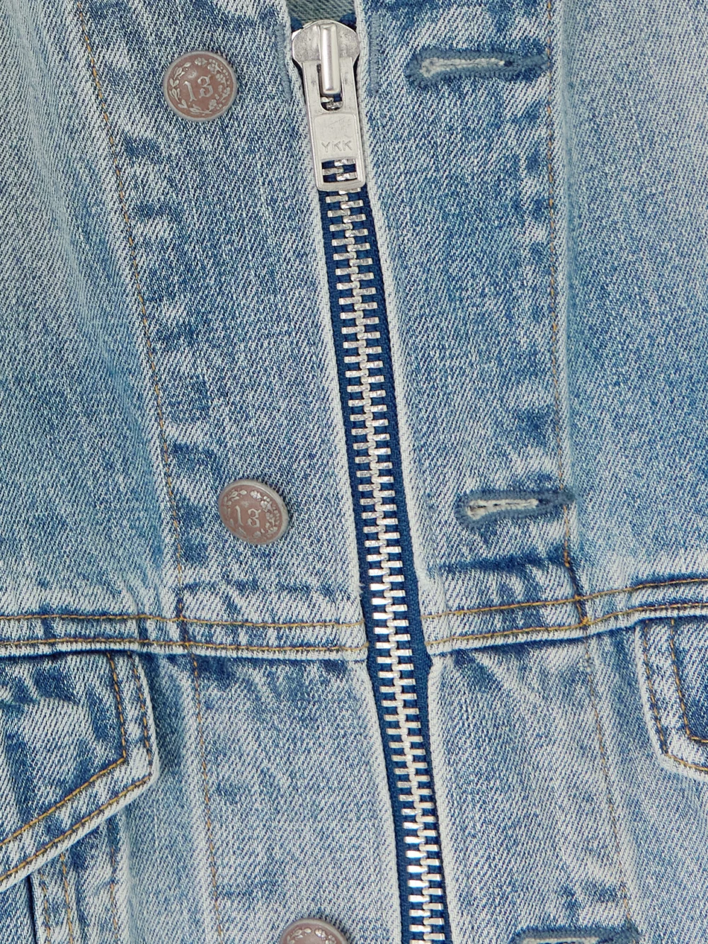Close-up detail of the R13 Distressed Denim Jacket