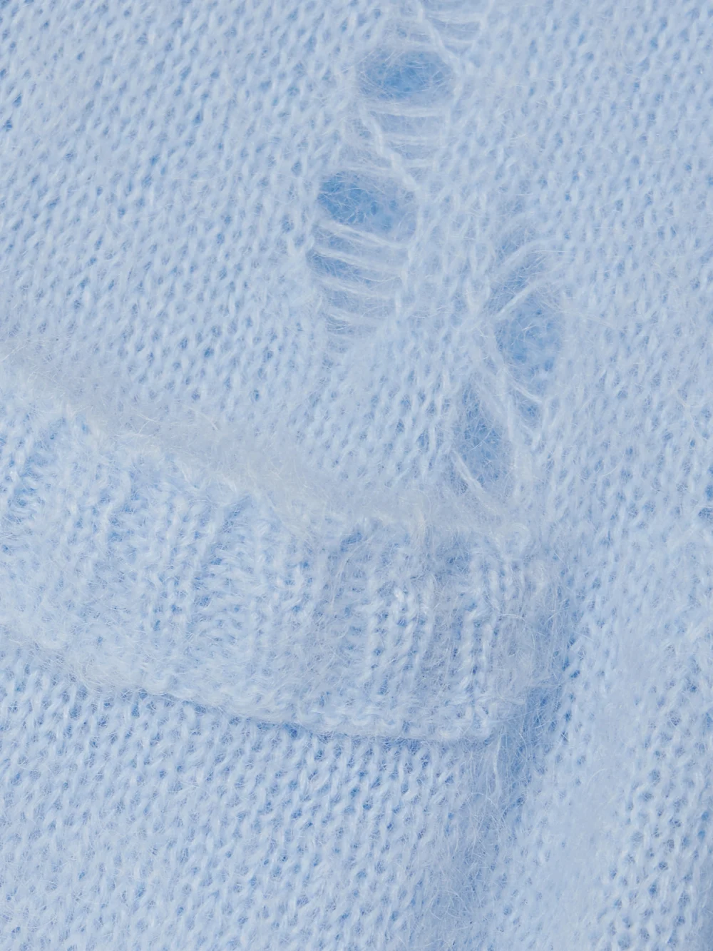 Close-up detail of the R13 Distressed Knitted Cardigan
