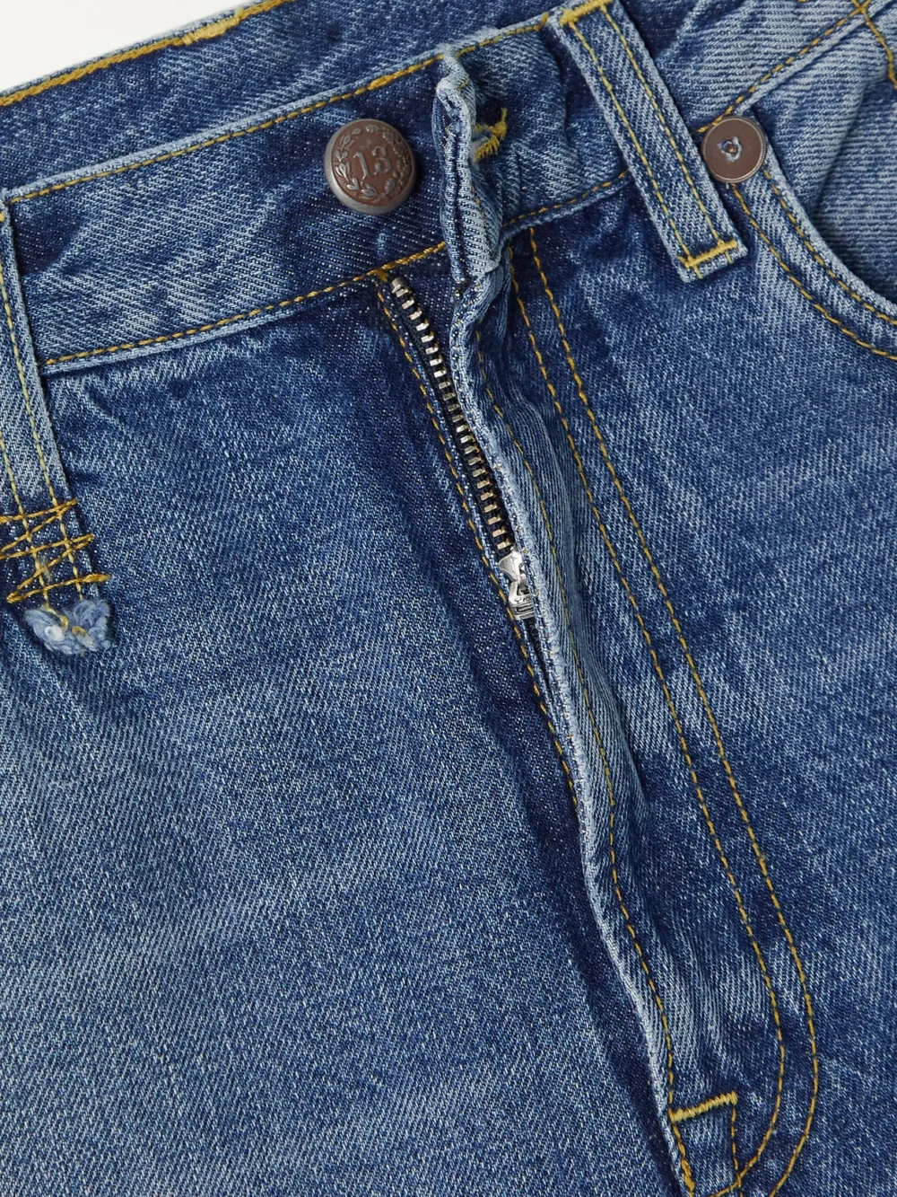 Close-up detail of the R13 Jane Distressed High-rise Straight-leg Jeans