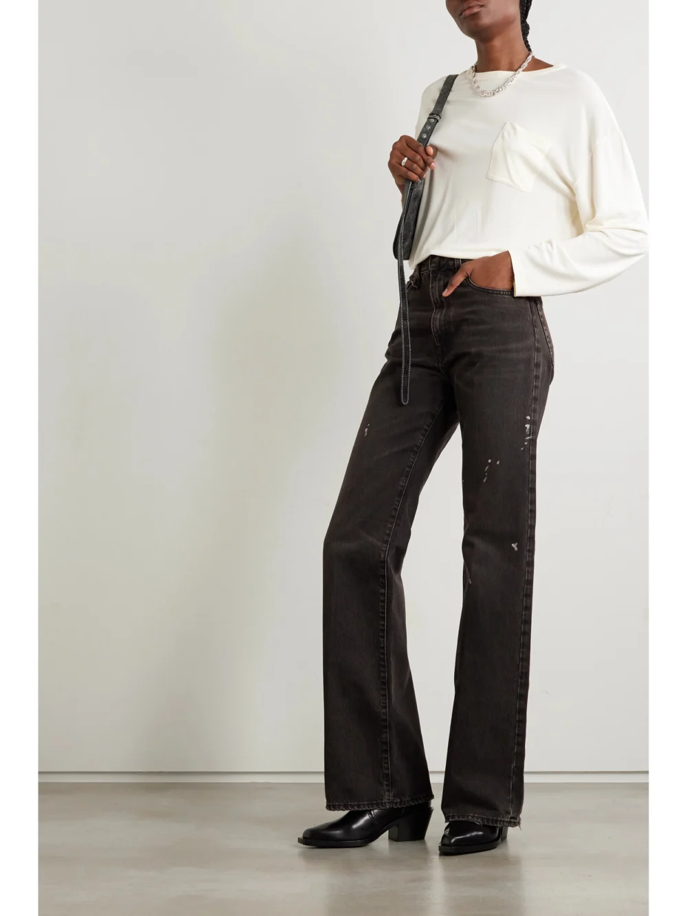 R13 Jane Paint-splattered High-rise Wide-leg Jeans, worn by a model