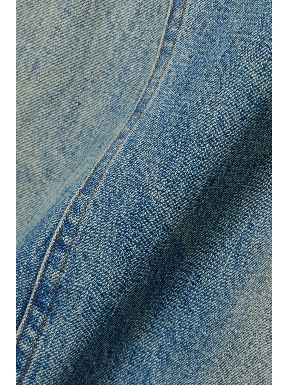 Close-up detail of the R13 Jesse Distressed Denim Midi Skirt