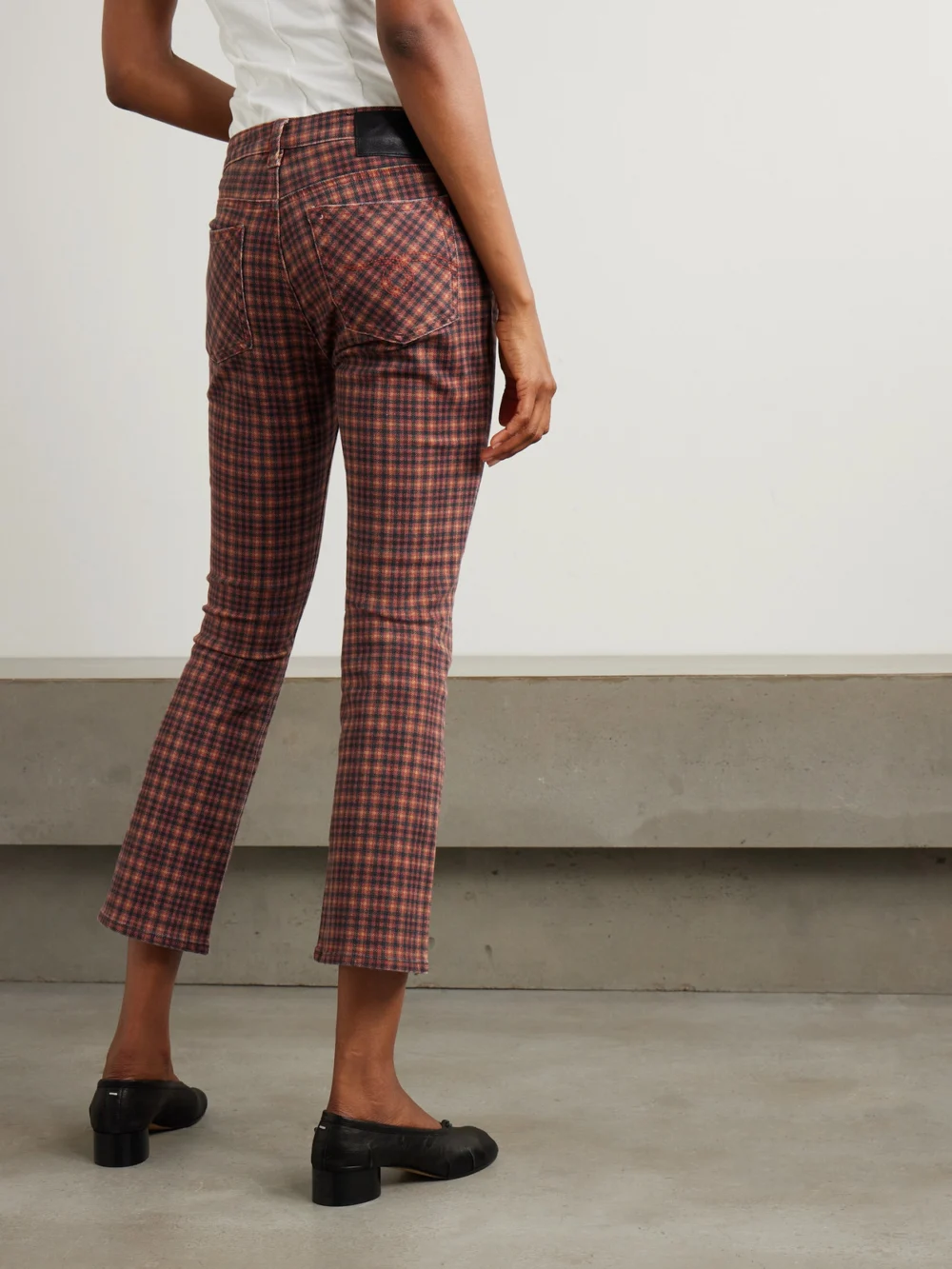 Back view of the R13 Kick Fit Cropped Checked High-rise Flared Jeans