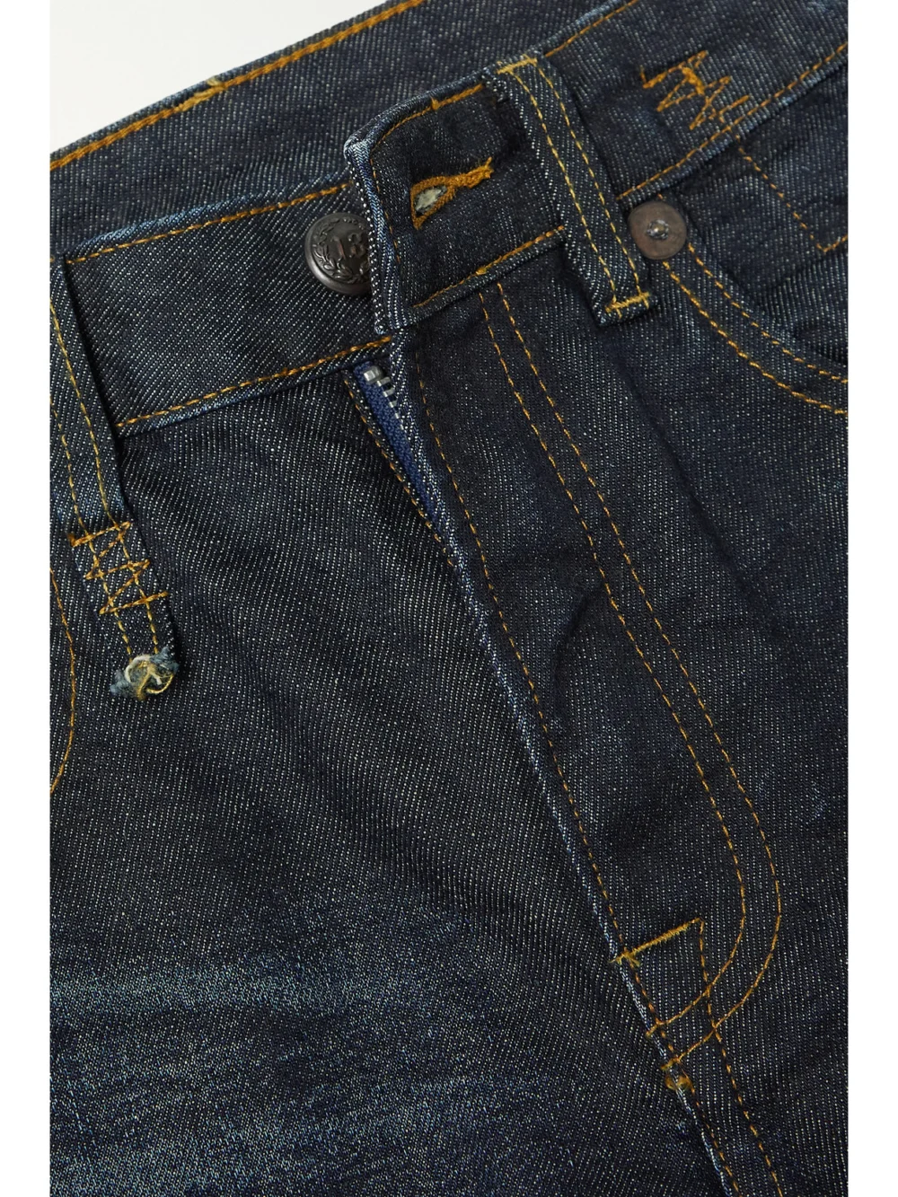 Close-up detail of the R13 Kick Fit Cropped High-rise Flared Jeans